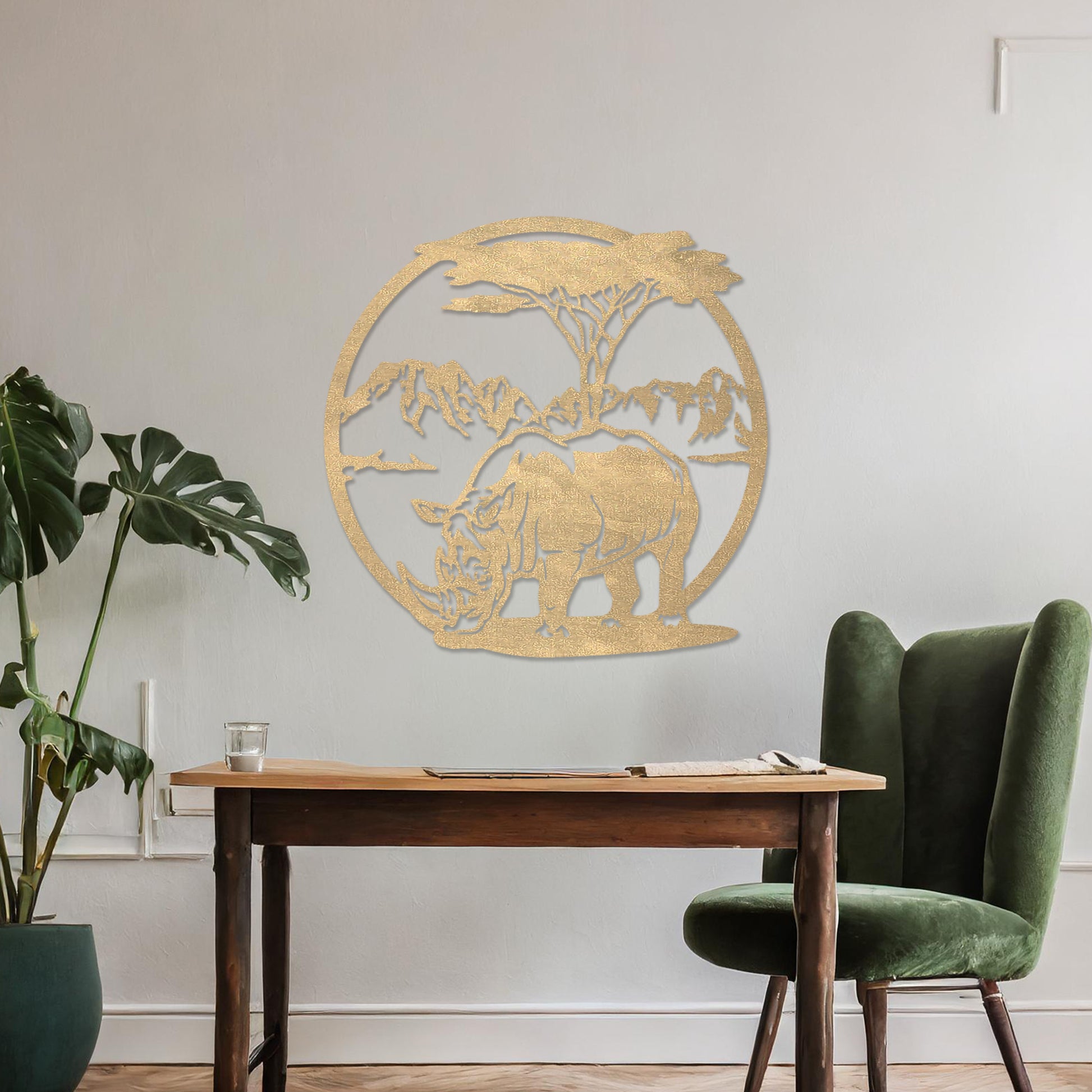 Wooden wall art design featuring a rhinoceros beneath a tree with a mountain backdrop, framed in a circular shape, placed on a neutral wall within modern room decor. The design captures the majesty of wildlife in a serene landscape.