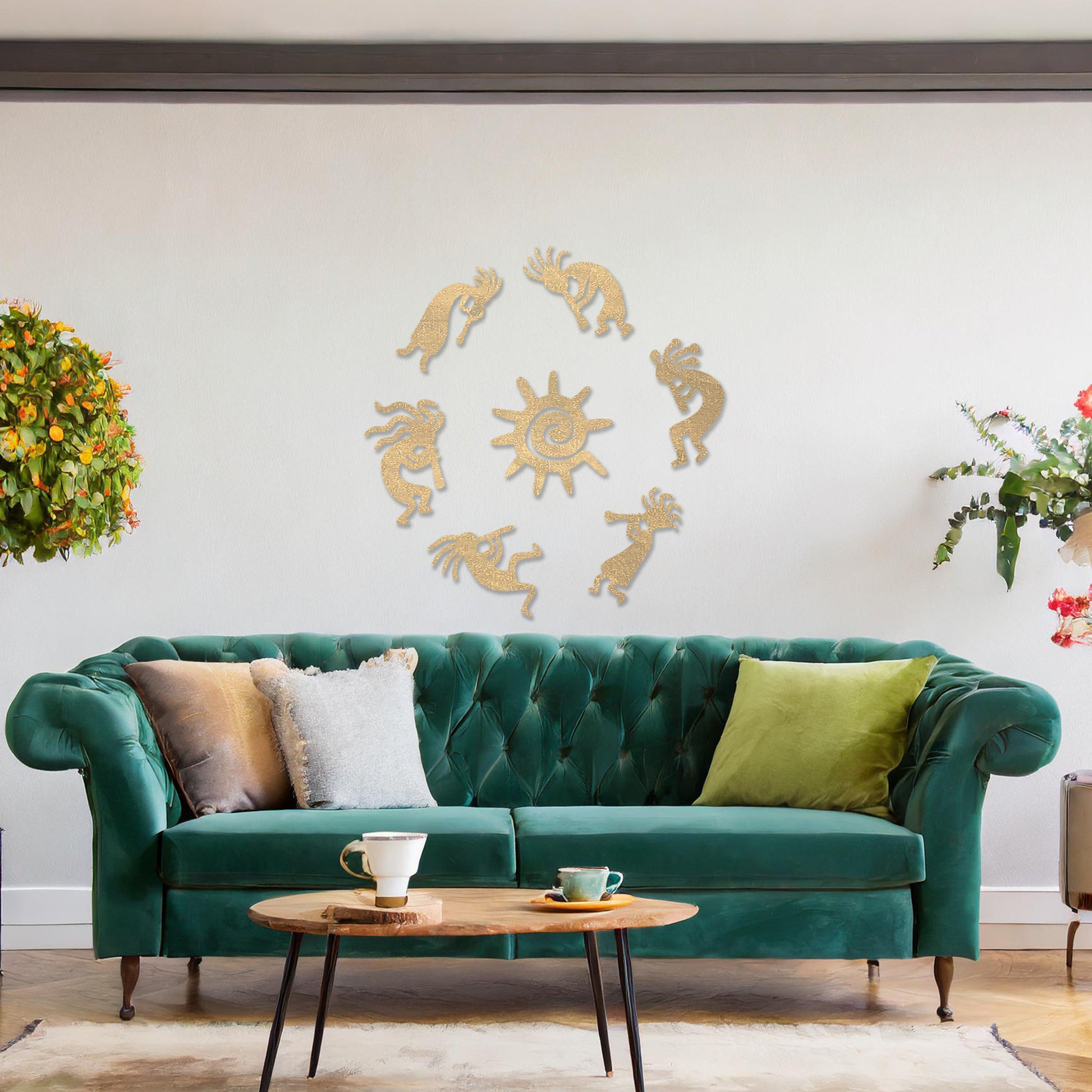 Wooden wall art featuring a circular arrangement of dancing figures surrounding a central sun design. The artwork is displayed on a neutral wall within modern room decor, highlighting its tribal and artistic charm.