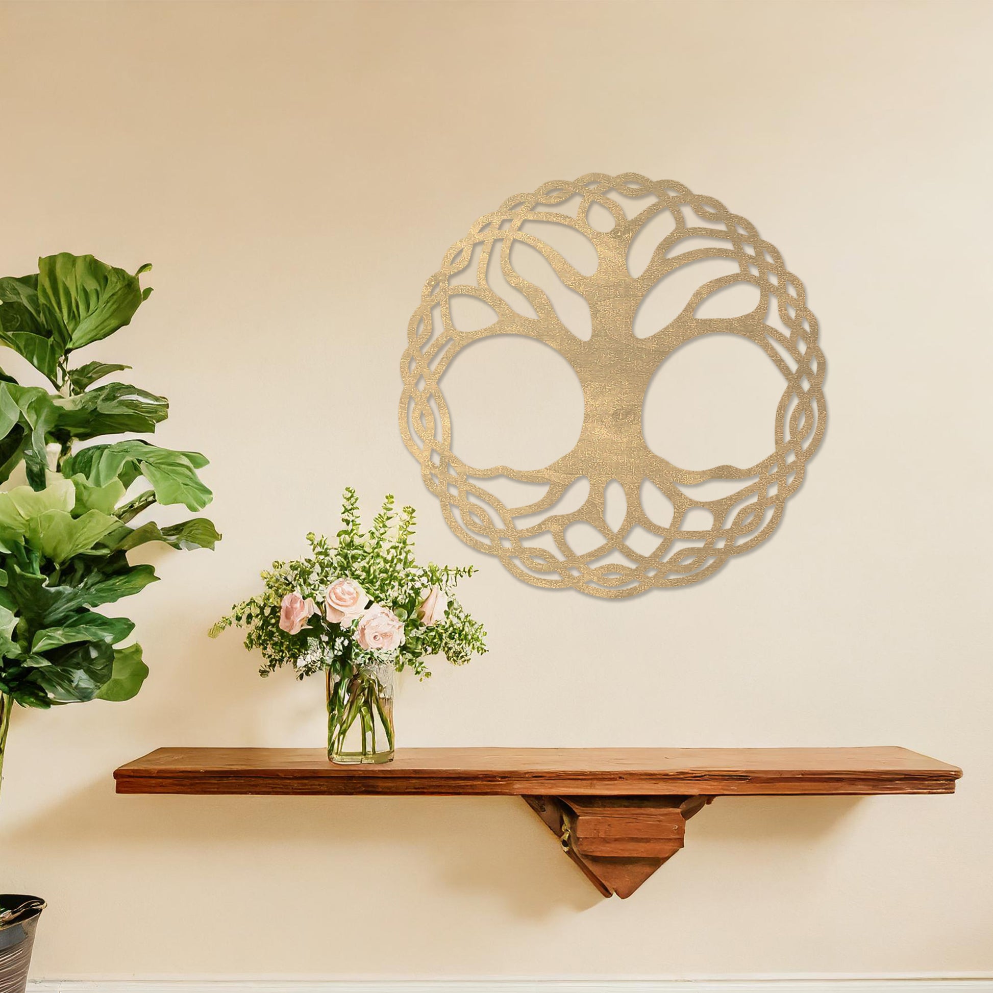 Wooden wall art depicting a circular tree of life design with intertwined roots and branches, placed on a neutral wall within a modern room decor, highlighting its intricate craftsmanship and symbolic aesthetic.