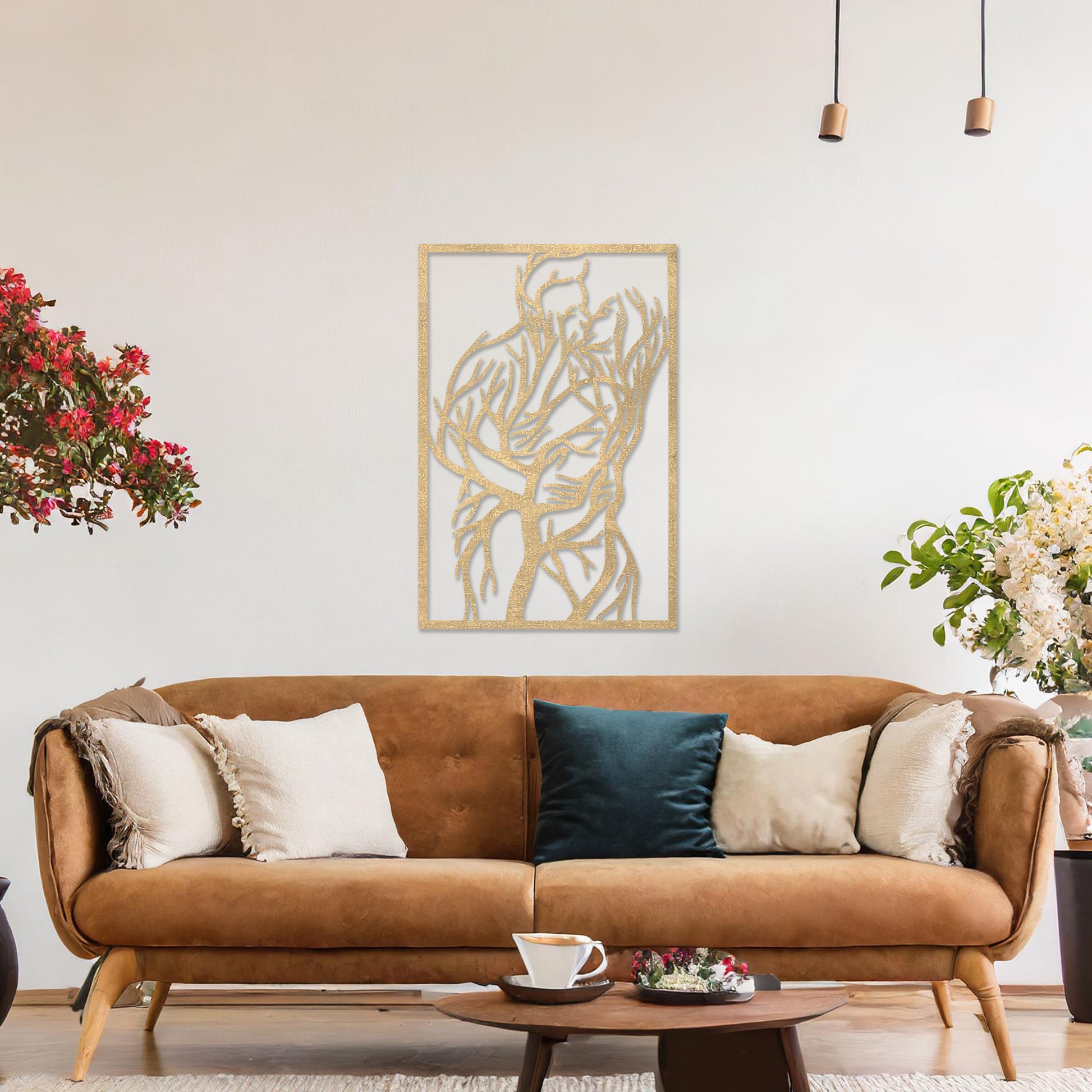 Wooden wall art featuring a rectangular design of two intertwined human figures stylised with tree branches, symbolising connection and unity. The artwork is displayed on a neutral wall within modern room decor, highlighting its artistic and emotional depth.