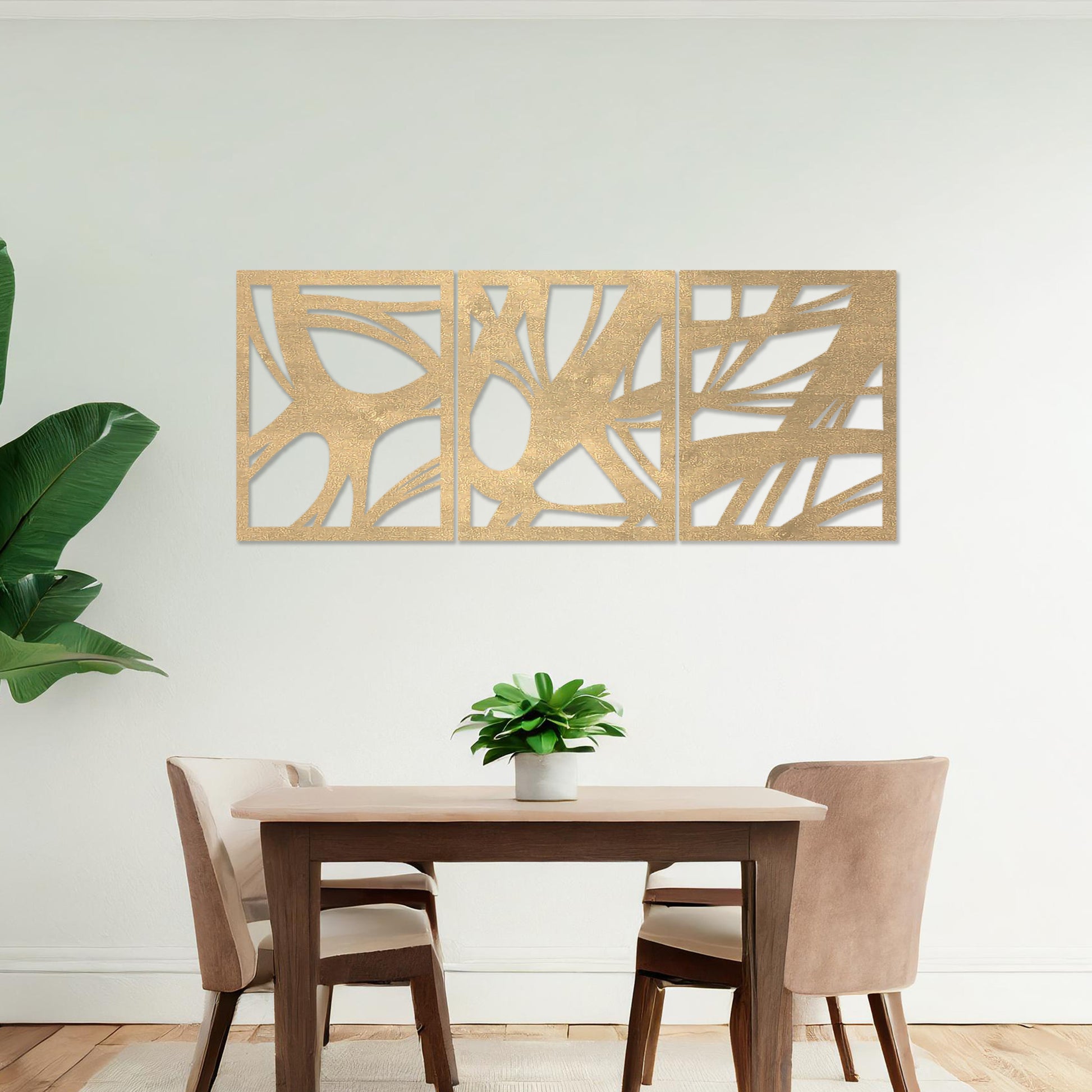Wooden wall art design featuring a three-panel abstract composition with flowing, organic shapes and cutouts, placed on a neutral wall within modern room decor. The design blends dynamic movement and minimalism for a contemporary look.