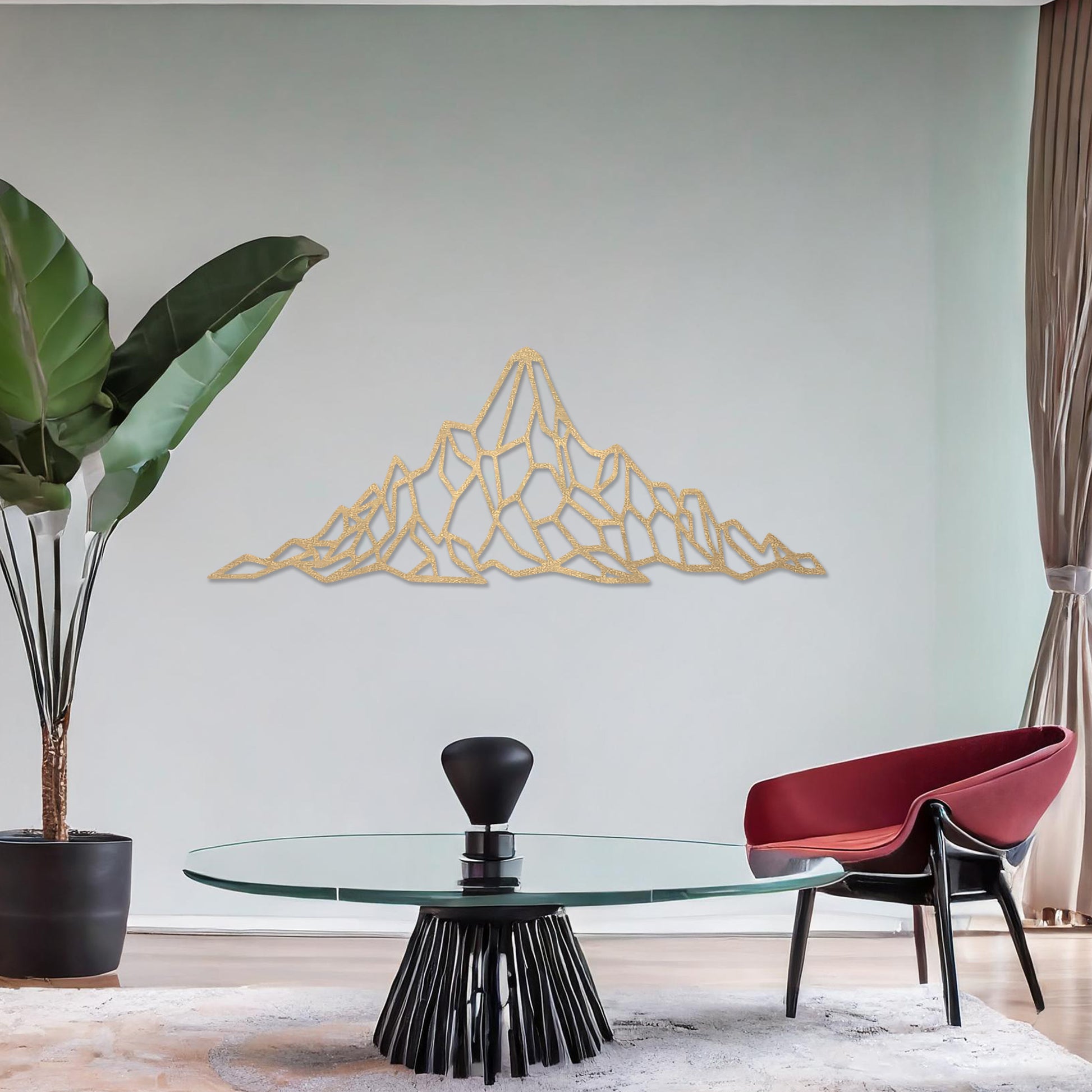 Wooden wall art featuring a geometric mountain range design with angular, interconnected shapes. The artwork is displayed on a neutral wall within modern room decor, emphasising its bold and minimalist aesthetic.