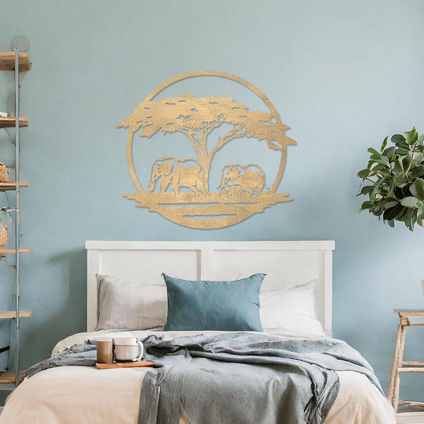Wooden wall art design featuring two elephants under a tree, framed in a circular shape, placed on a neutral wall within modern room decor. The design evokes a sense of tranquility and nature with its detailed depiction of wildlife.
