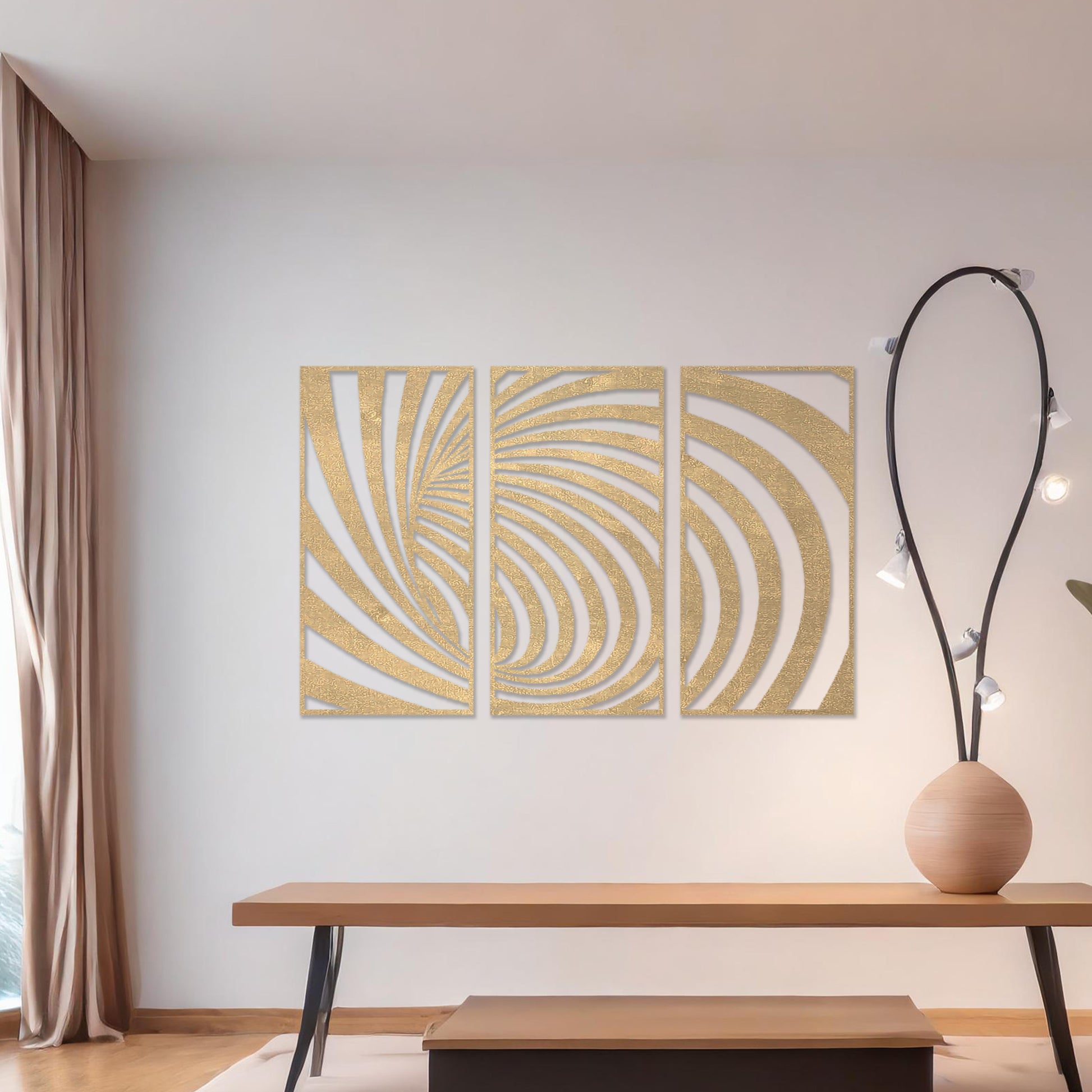 Wooden wall art comprising three panels with an abstract spiral design, displayed on a neutral wall within modern room decor, highlighting its bold and contemporary artistic craftsmanship.