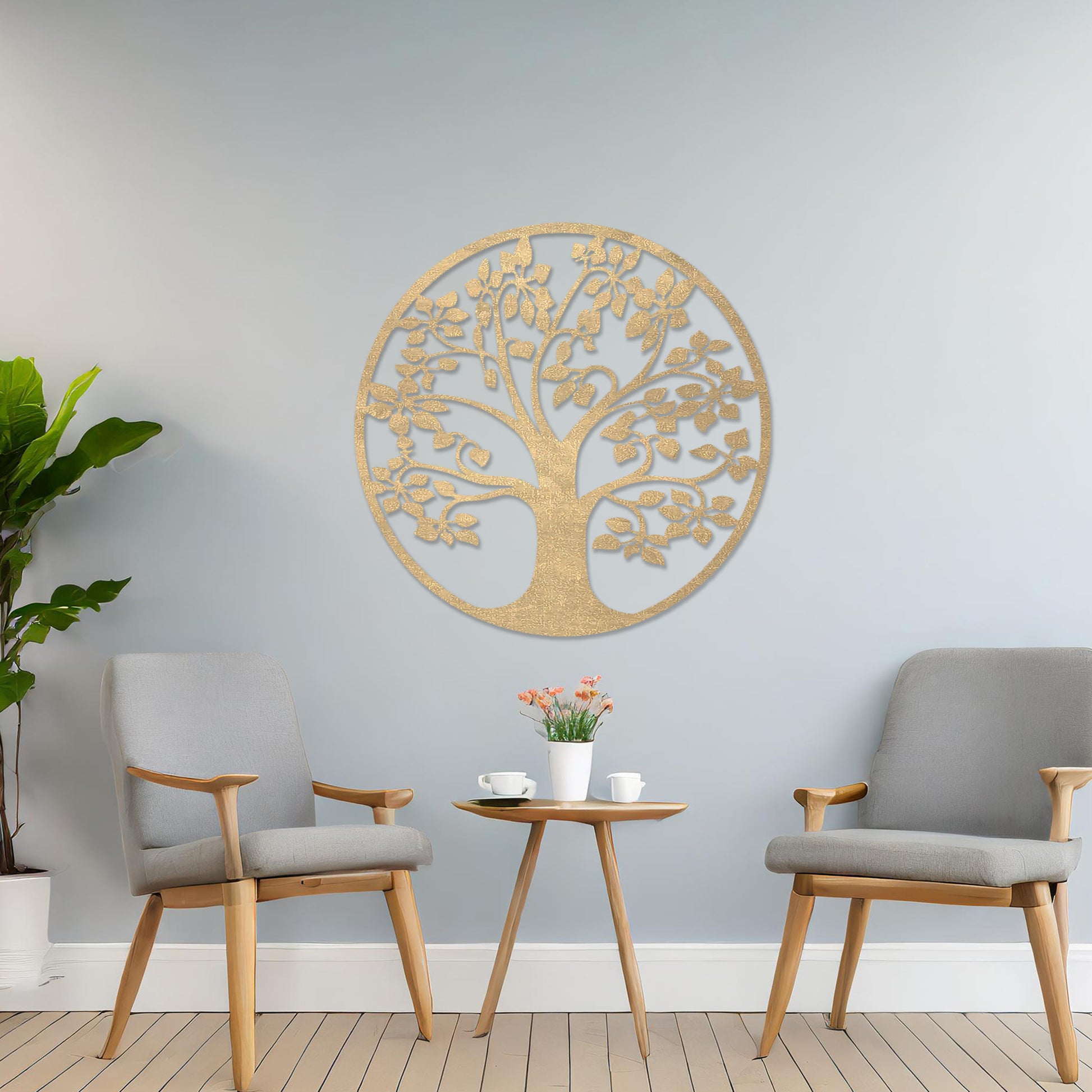 Wooden wall art featuring a circular tree design with detailed leaves and branches, displayed on a neutral wall within modern room decor, emphasising its natural elegance and intricate craftsmanship.