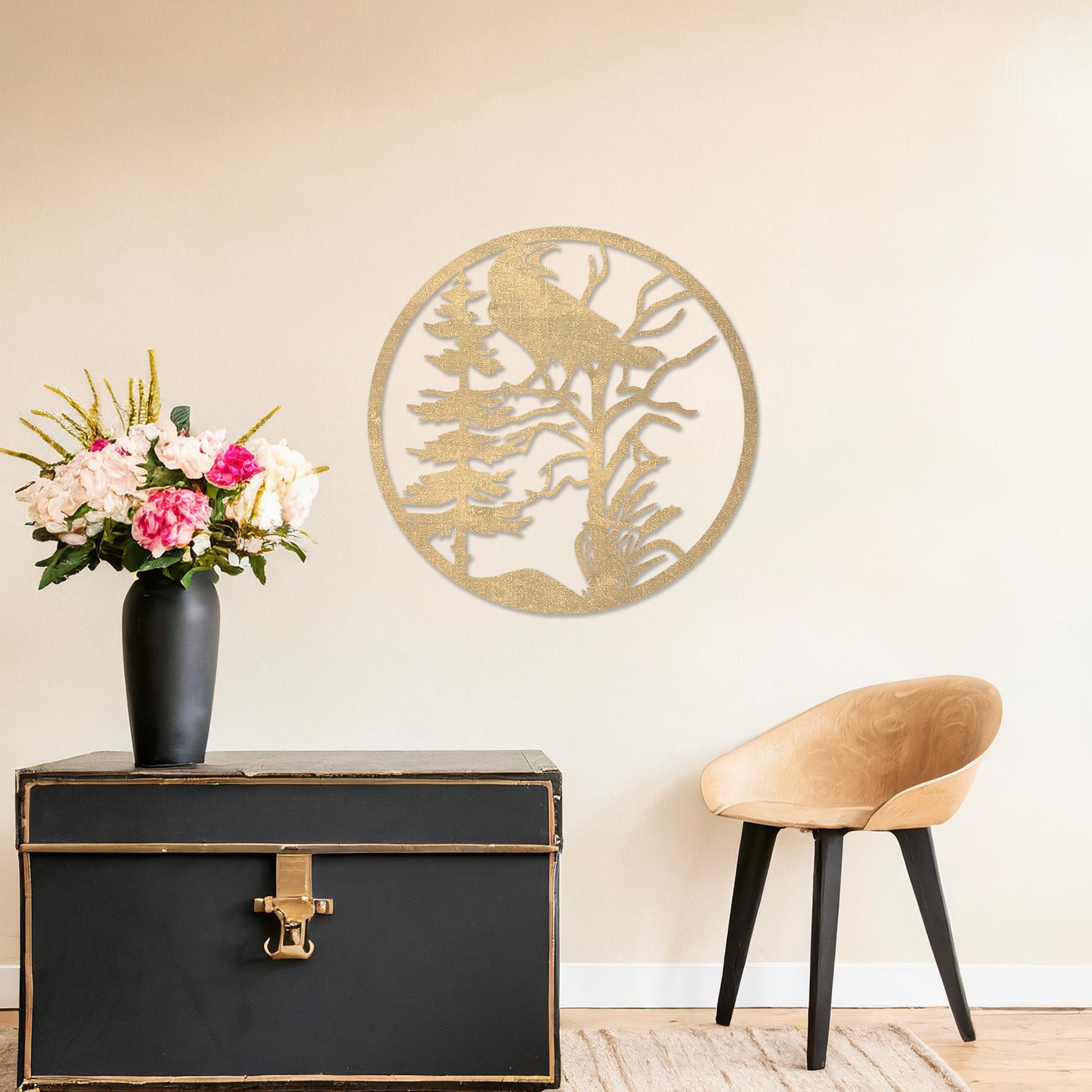 Wooden wall art featuring a circular design with a silhouette of a bird perched on a tree surrounded by natural elements. The artwork is displayed on a neutral wall within modern room decor, highlighting its rustic and nature-inspired design.