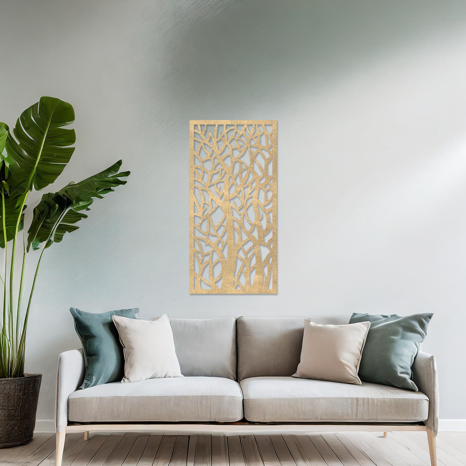 Wooden wall art featuring a vertical design of intertwined tree trunks and branches, displayed on a neutral wall within modern room decor, showcasing its intricate and artistic craftsmanship.