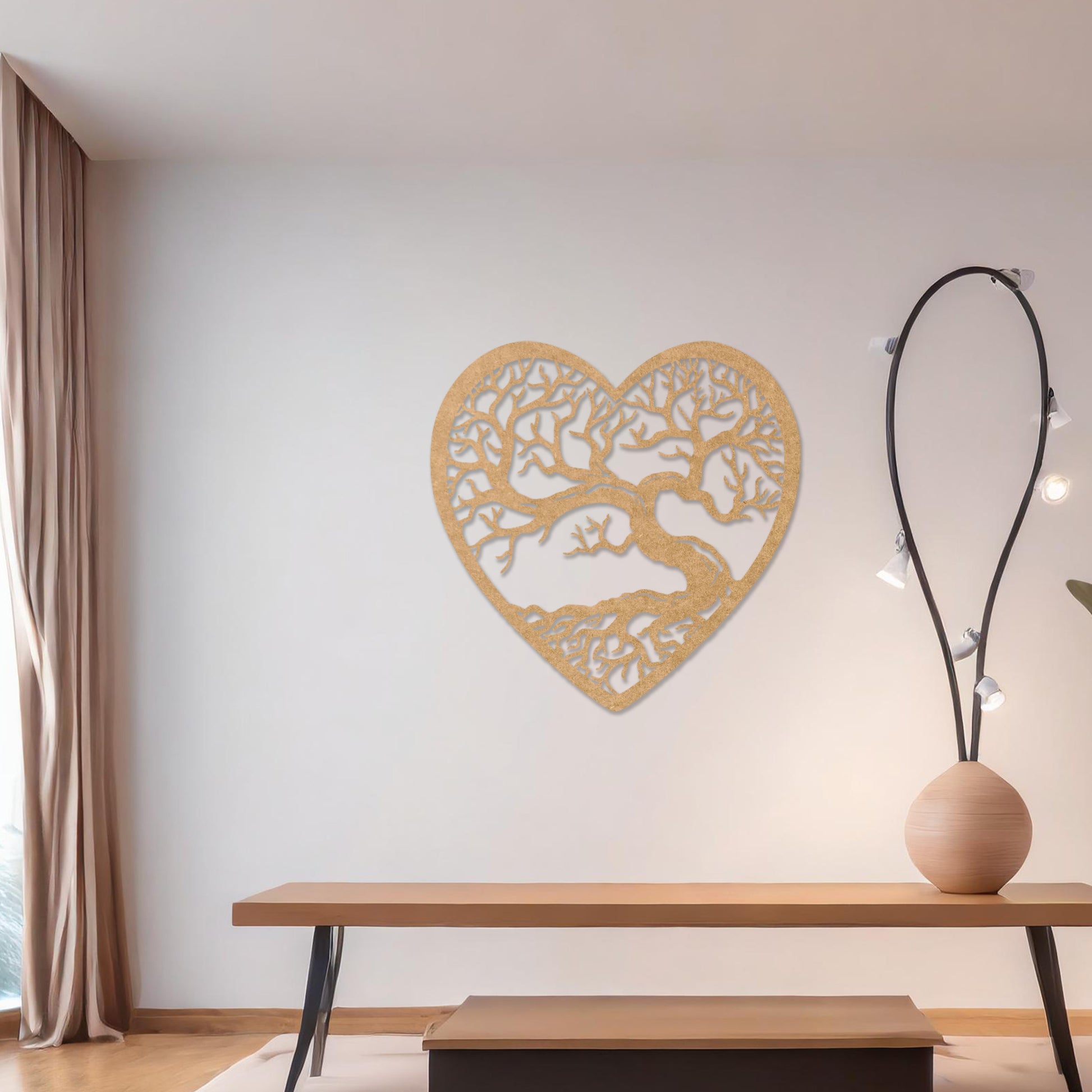 Wooden wall art featuring a heart-shaped design with an intricate tree and branching roots, displayed on a neutral wall within modern room decor, highlighting its natural and artistic craftsmanship.