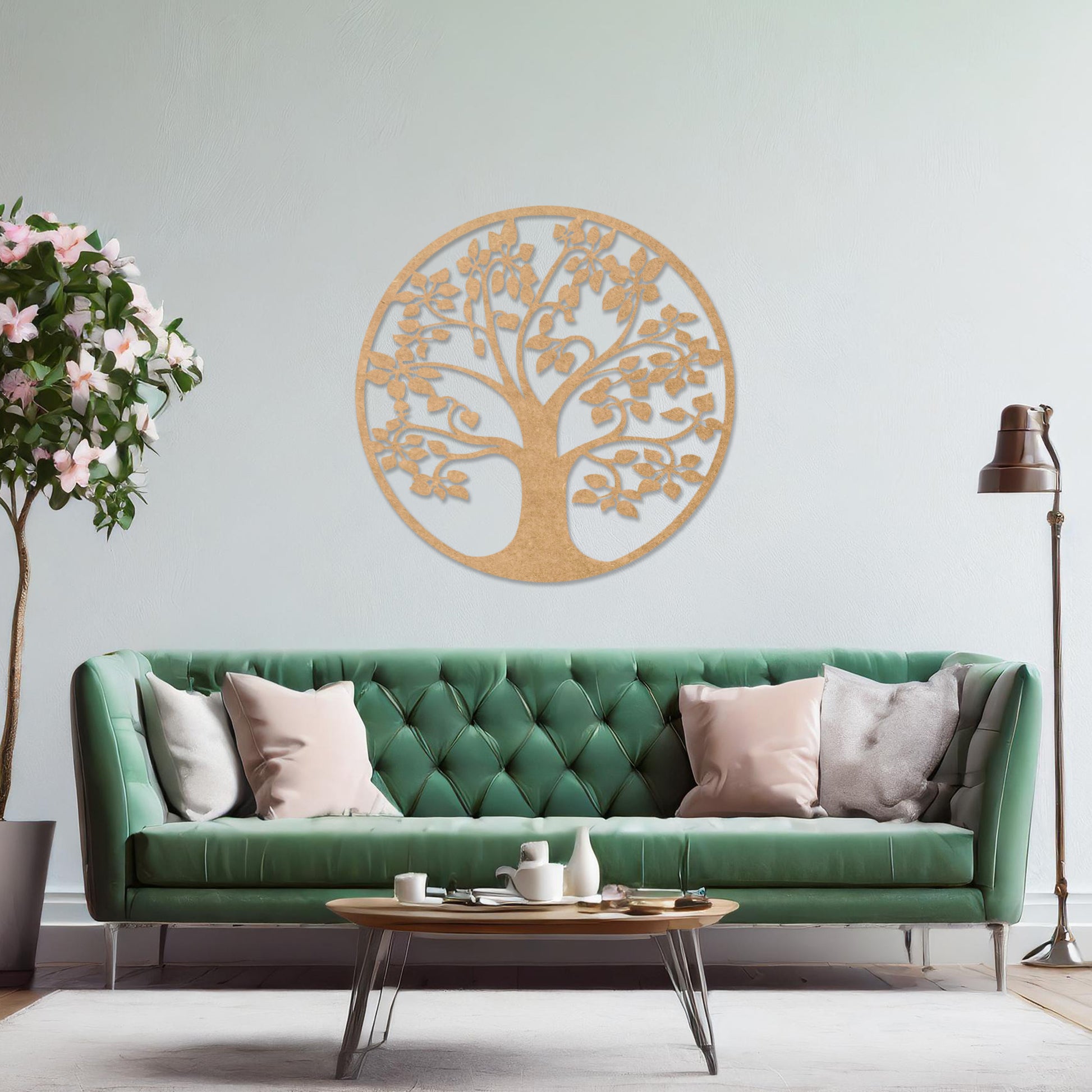 Wooden wall art featuring a circular tree design with detailed leaves and branches, displayed on a neutral wall within modern room decor, emphasising its natural elegance and intricate craftsmanship.