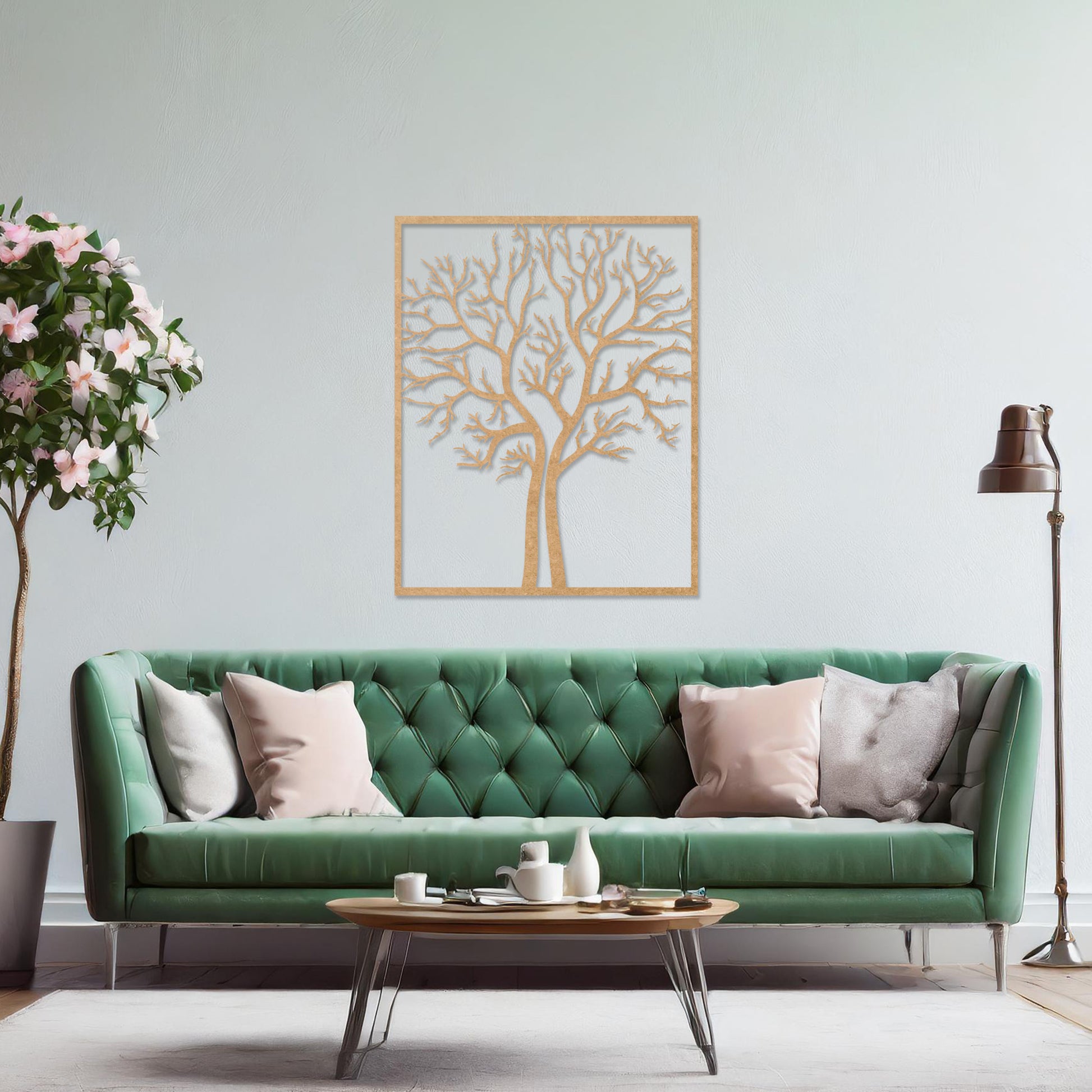 Wooden wall art featuring a minimalist tree design with bare branches, displayed on a neutral wall within modern room decor, highlighting its elegant and natural craftsmanship.