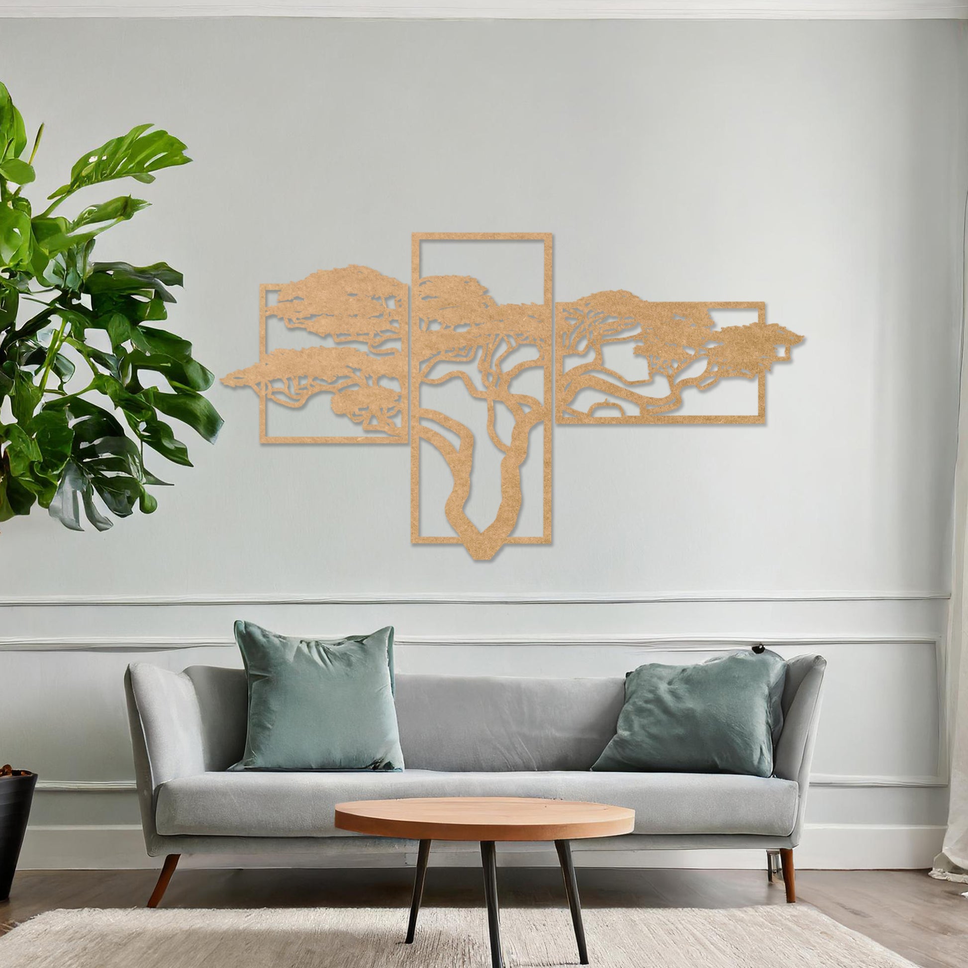 Wooden wall art featuring a multi-panel design of a tree with intricate branches, placed on a neutral wall within modern room decor, showcasing its detailed craftsmanship and elegant composition.