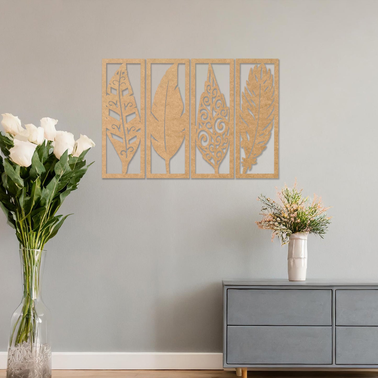 Wooden wall art design featuring five vertical panels, each with a different leaf design, placed on a neutral wall within modern room decor. The design combines organic shapes with intricate details for a natural yet elegant aesthetic.