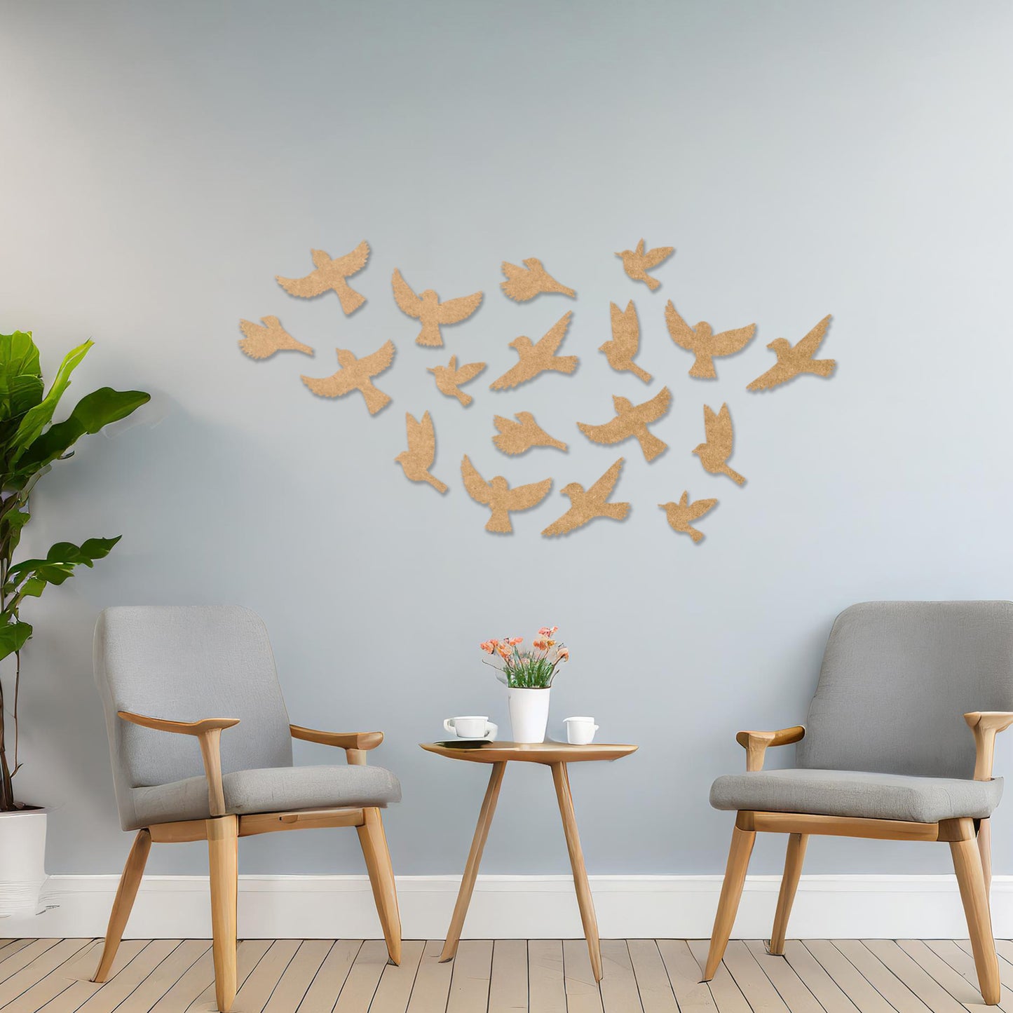 Wooden wall art featuring a flock of birds in flight arranged in a scattered pattern, displayed on a neutral wall within modern room decor, highlighting its dynamic and nature-inspired craftsmanship.