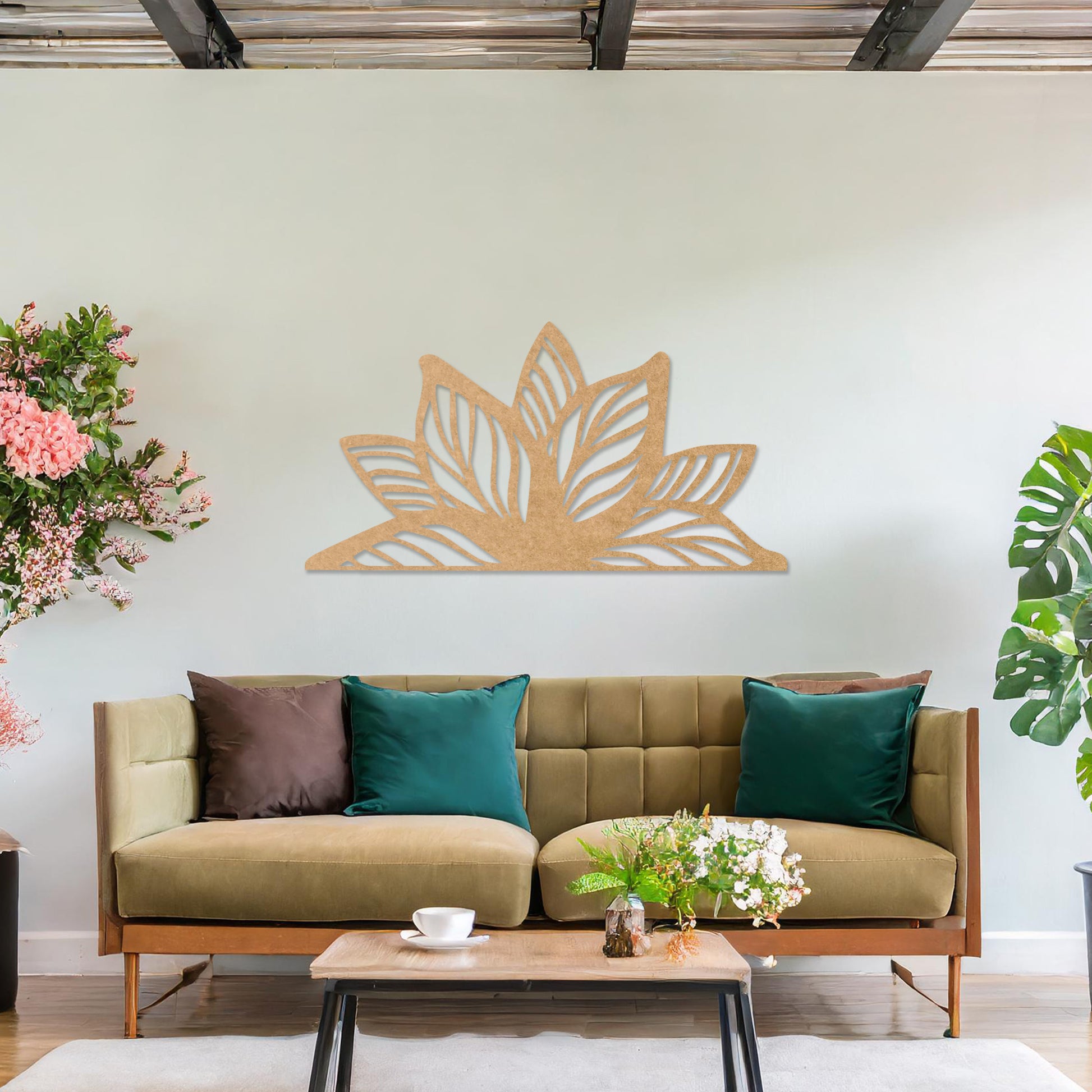 Wall art featuring a lotus-inspired design with layered leaves and intricate cut-out patterns. The piece is displayed on a neutral wall within modern decor, adding a natural and calming focal point to the space.