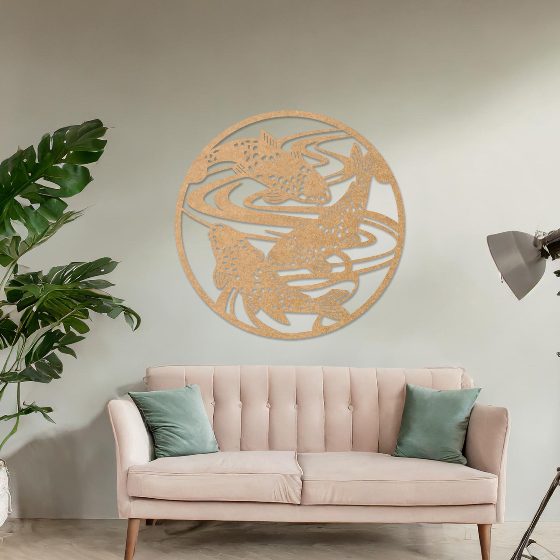 Wooden wall art design featuring koi fish swimming in circular patterns, framed in a round shape, placed on a neutral wall within modern room decor. The design evokes tranquility and movement with its elegant depiction of nature.