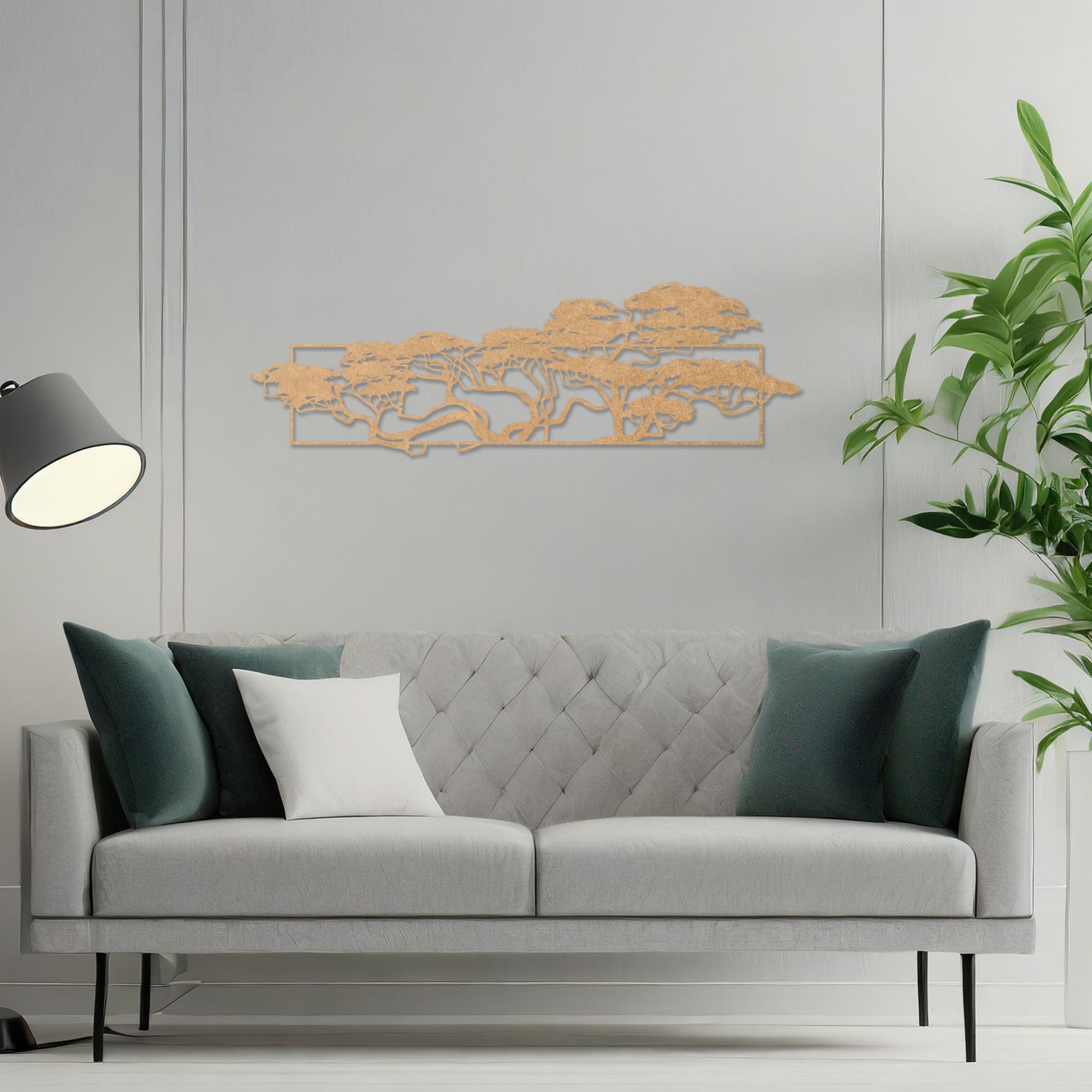 Wooden wall art featuring a panoramic design of windswept trees with intricate branches, displayed on a neutral wall within modern room decor, emphasising its natural elegance and artistic detail.