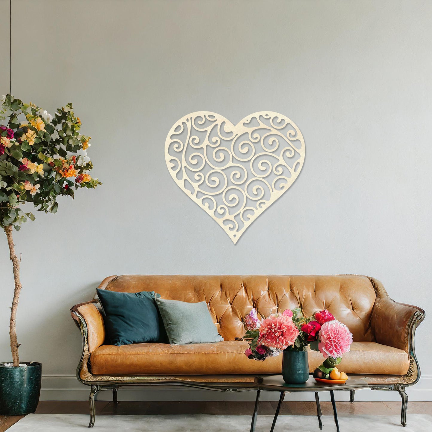 Wooden wall art featuring a heart-shaped design with intricate swirling patterns, displayed on a neutral wall within modern room decor, showcasing its elegant and artistic craftsmanship.