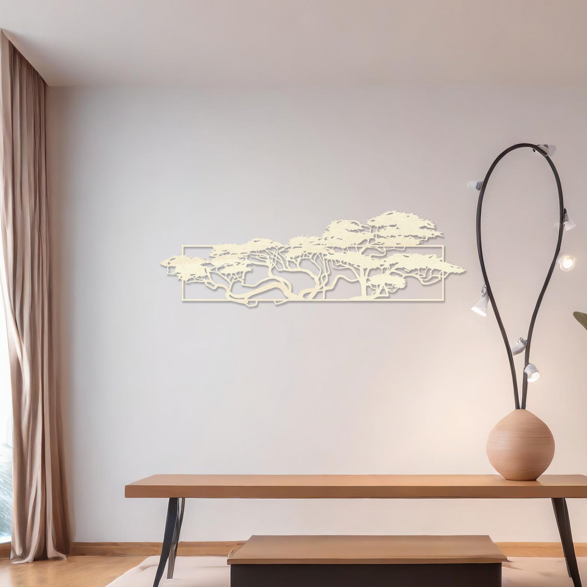 Wooden wall art featuring a panoramic design of windswept trees with intricate branches, displayed on a neutral wall within modern room decor, emphasising its natural elegance and artistic detail.
