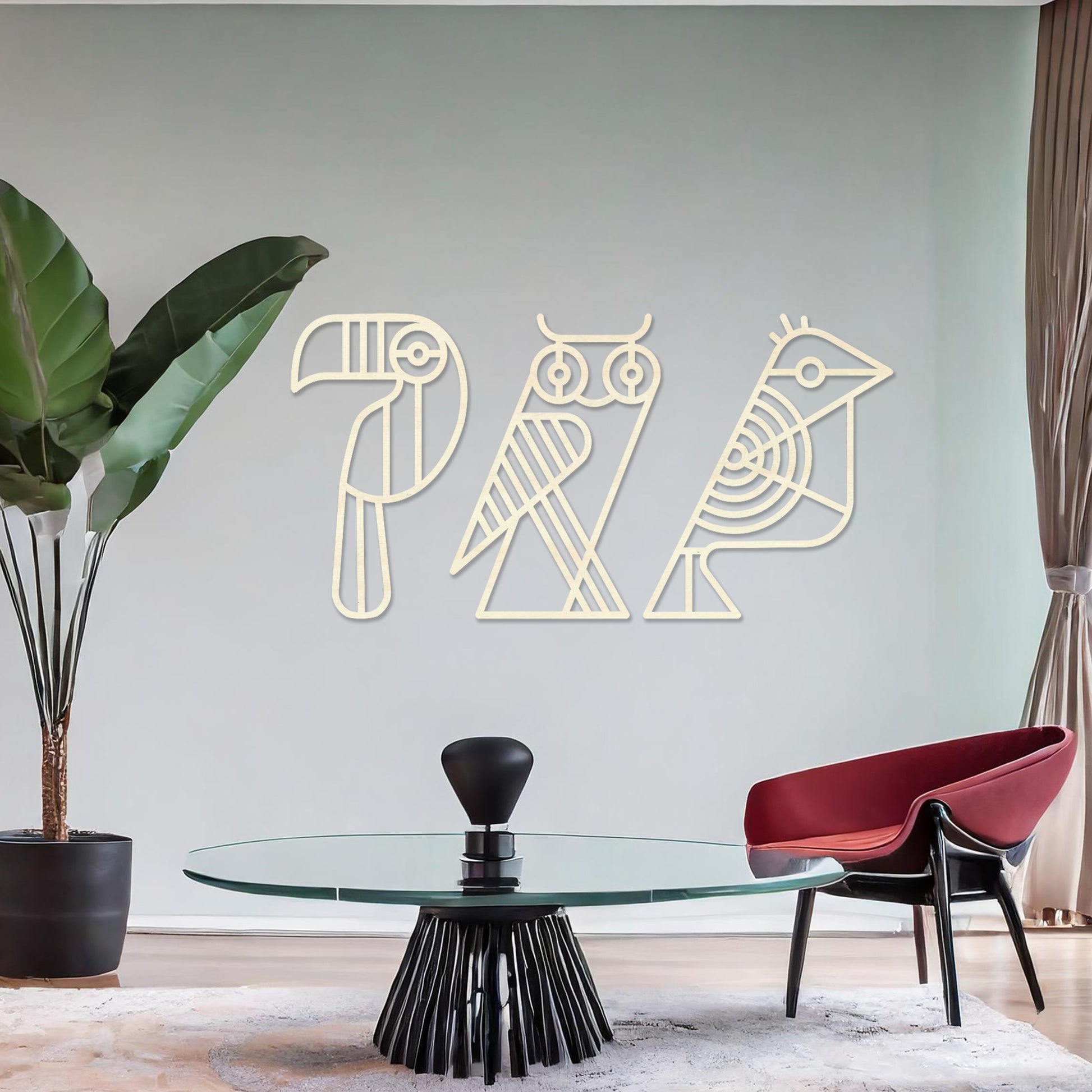 Wooden wall art featuring a trio of abstract geometric bird designs, including a toucan, an owl, and a sparrow. The artwork is displayed on a neutral wall within modern room decor, showcasing its playful and artistic charm.
