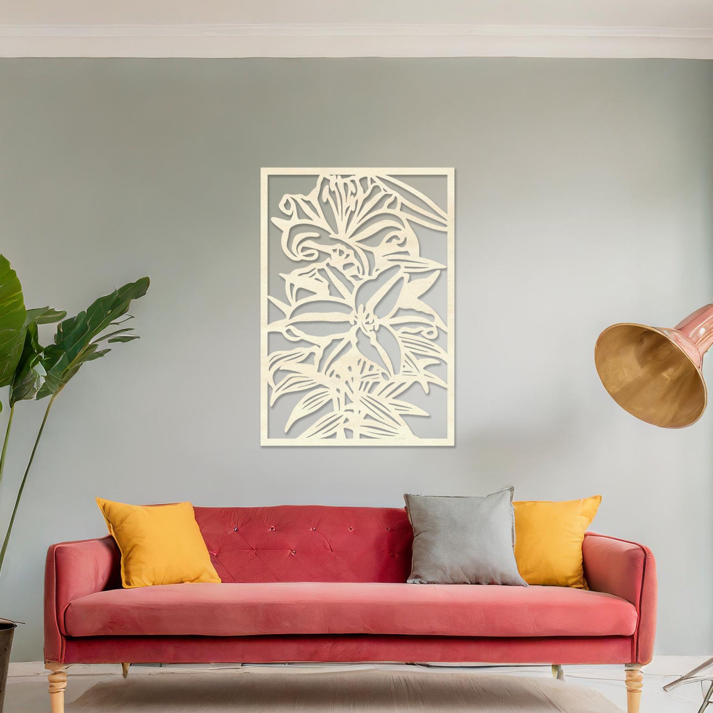 Wall art featuring a botanical design of blooming lilies with intricate details of petals and leaves. The artwork is displayed on a neutral wall within modern room decor, enhancing the space with a natural and elegant touch.