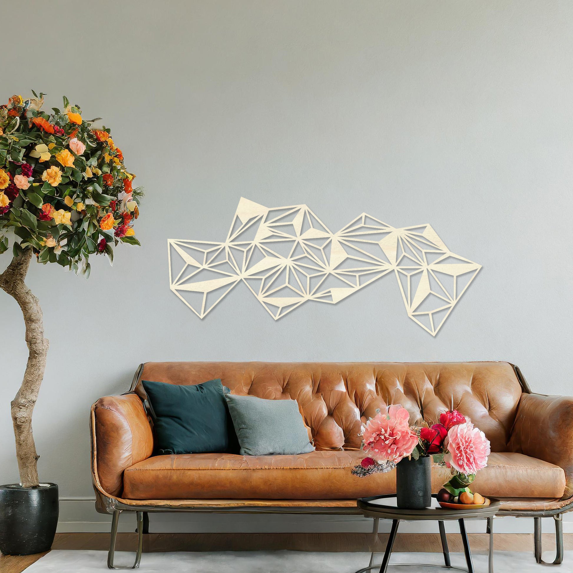 The design features an abstract arrangement of interlocking triangles, forming a dynamic, geometric pattern. Its sharp lines and angles create a bold, modern look, perfect for contemporary spaces.