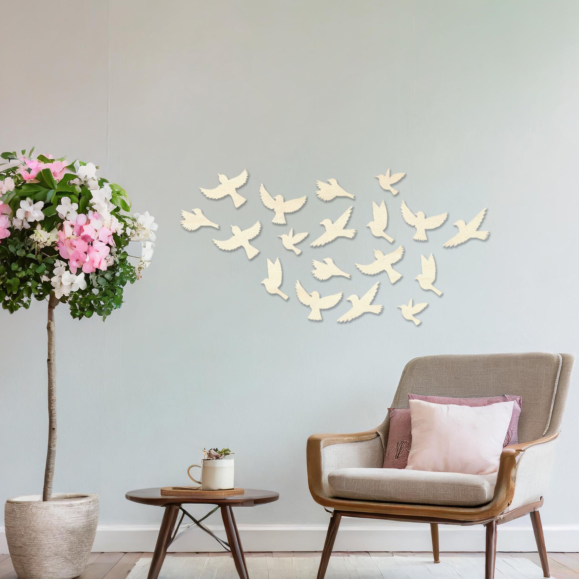 Wooden wall art featuring a flock of birds in flight arranged in a scattered pattern, displayed on a neutral wall within modern room decor, highlighting its dynamic and nature-inspired craftsmanship.