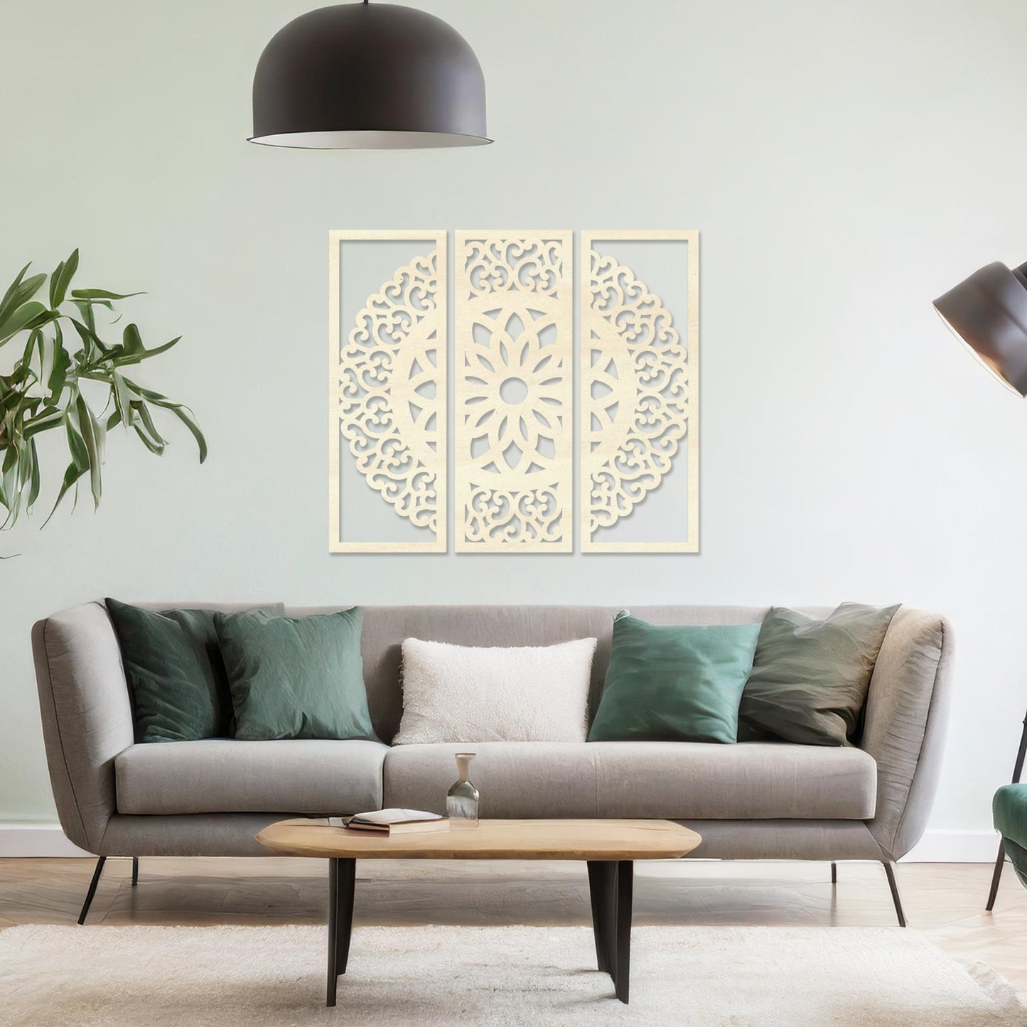 Wall art featuring a triptych design with an intricate mandala pattern framed across three panels. The artwork is displayed on a neutral wall within modern decor, adding a harmonious and decorative element to the space.