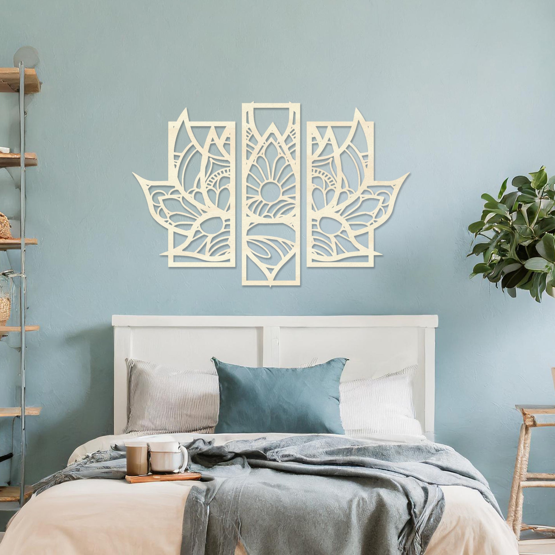 Wall art featuring a lotus-inspired floral design in three distinct panels with intricate geometric patterns. The piece is mounted on a neutral wall within modern room decor, adding elegance to the space.
