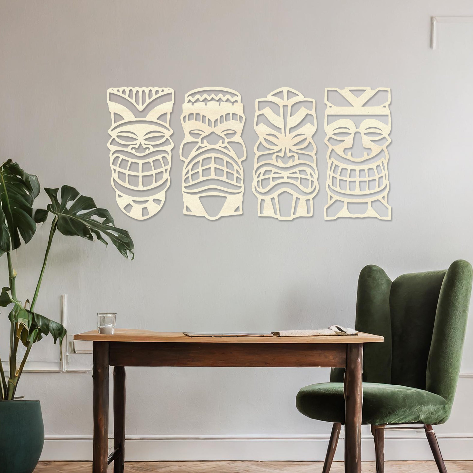 Wooden wall art design featuring four tribal masks arranged in a row on a neutral wall, set against modern room decor. The intricate design captures bold, expressive features and cultural motifs.