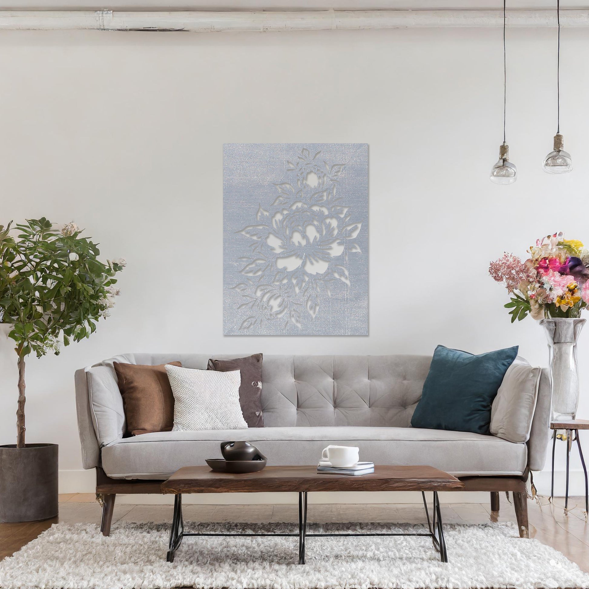 Wall art featuring a detailed floral design with blooming peonies and intricate leaves. The piece is mounted on a neutral wall within modern room decor, adding a touch of natural elegance to the space.