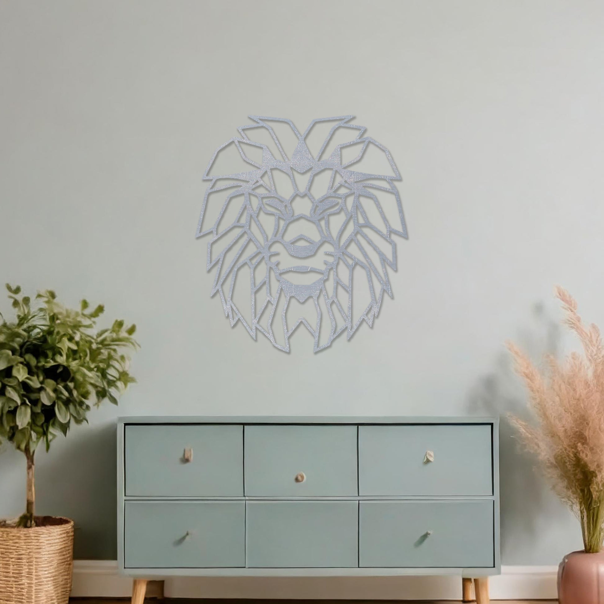 Wooden wall art showcasing a geometric lion head design with sharp, angular details, displayed on a neutral wall within modern room decor, emphasising its bold and striking craftsmanship.