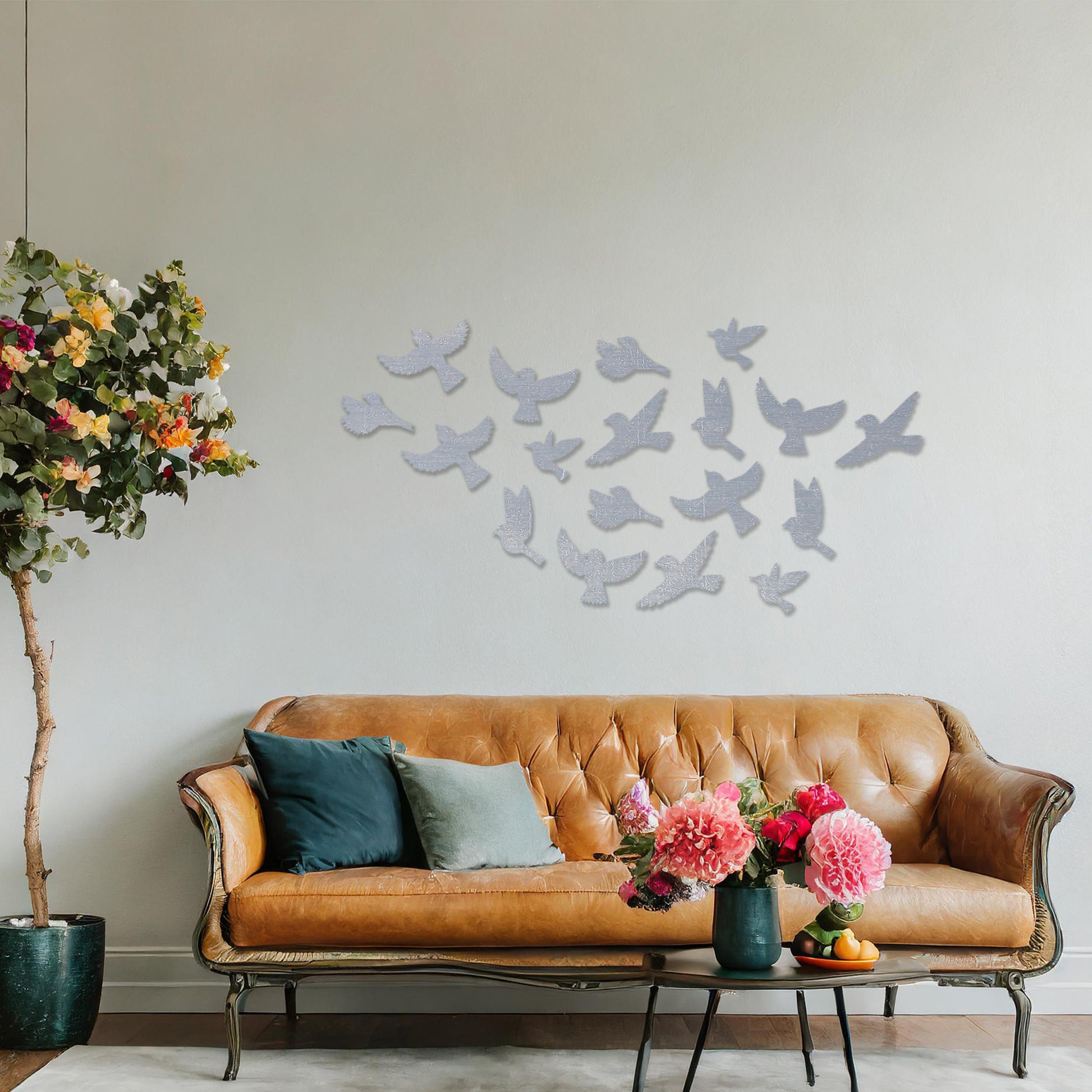 Wooden wall art featuring a flock of birds in flight arranged in a scattered pattern, displayed on a neutral wall within modern room decor, highlighting its dynamic and nature-inspired craftsmanship.