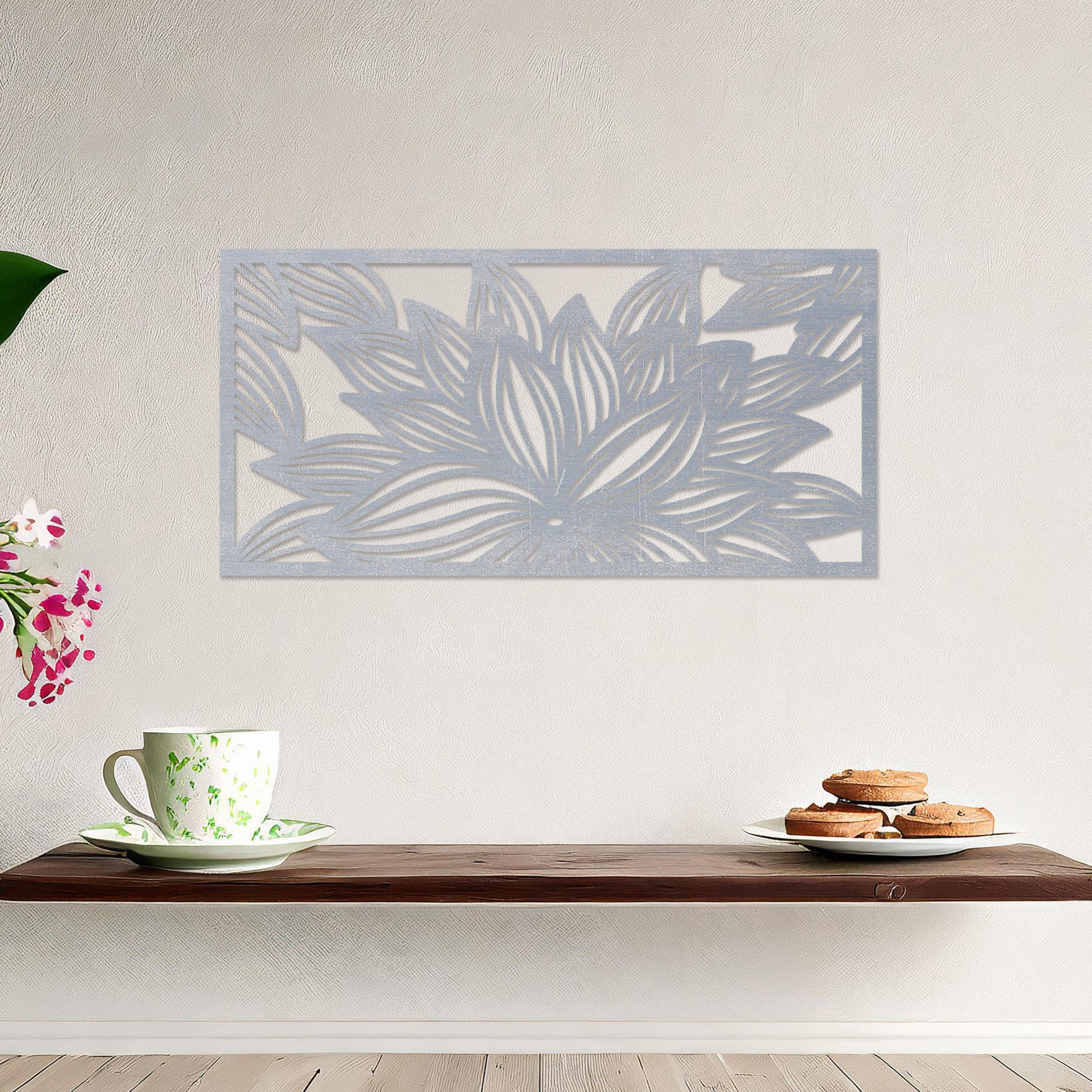 Wall art featuring a horizontal floral design with layered petals arranged in a dynamic and intricate pattern. The piece is displayed on a neutral wall within modern decor, adding an artistic and elegant focal point to the setting.