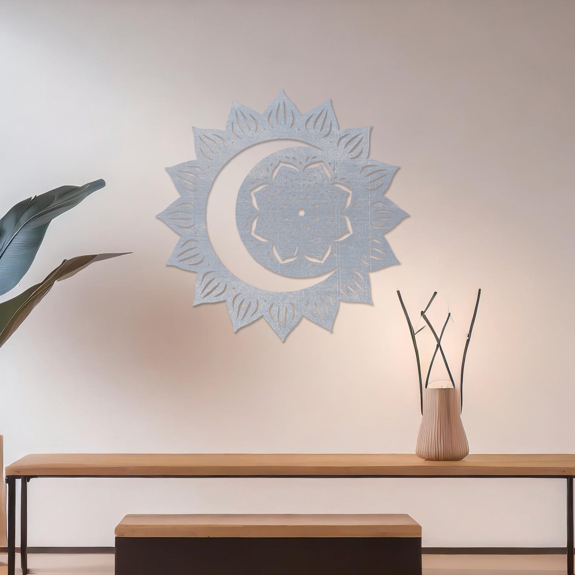 Wall art featuring a crescent moon surrounded by a mandala-inspired floral design with intricate details. The piece is displayed on a neutral wall within modern decor, adding a serene and decorative touch to the space.