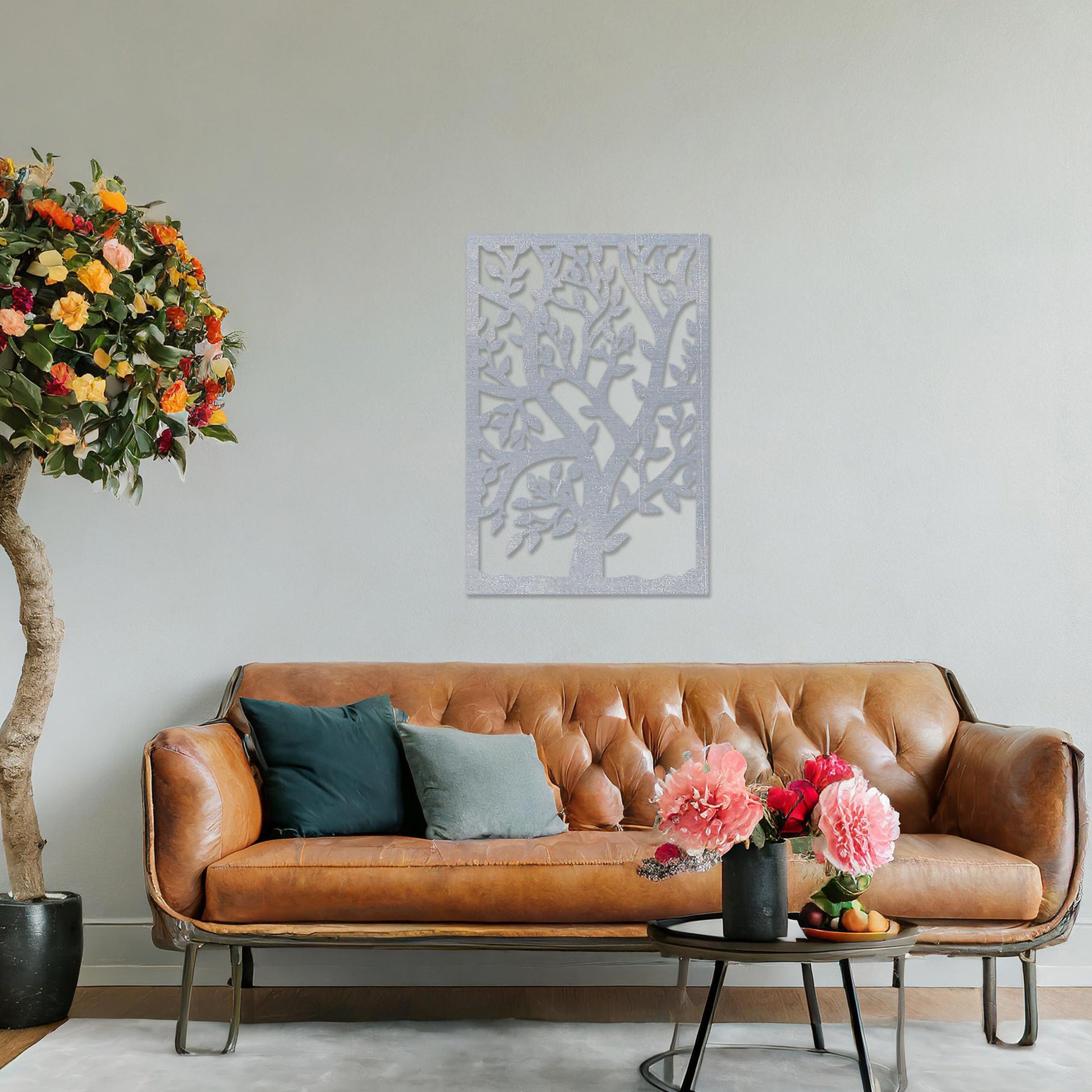 Wooden wall art featuring a rectangular design with an intricate tree motif, showcasing detailed branches and leaves. The artwork is displayed on a neutral wall within modern room decor, highlighting its natural elegance.