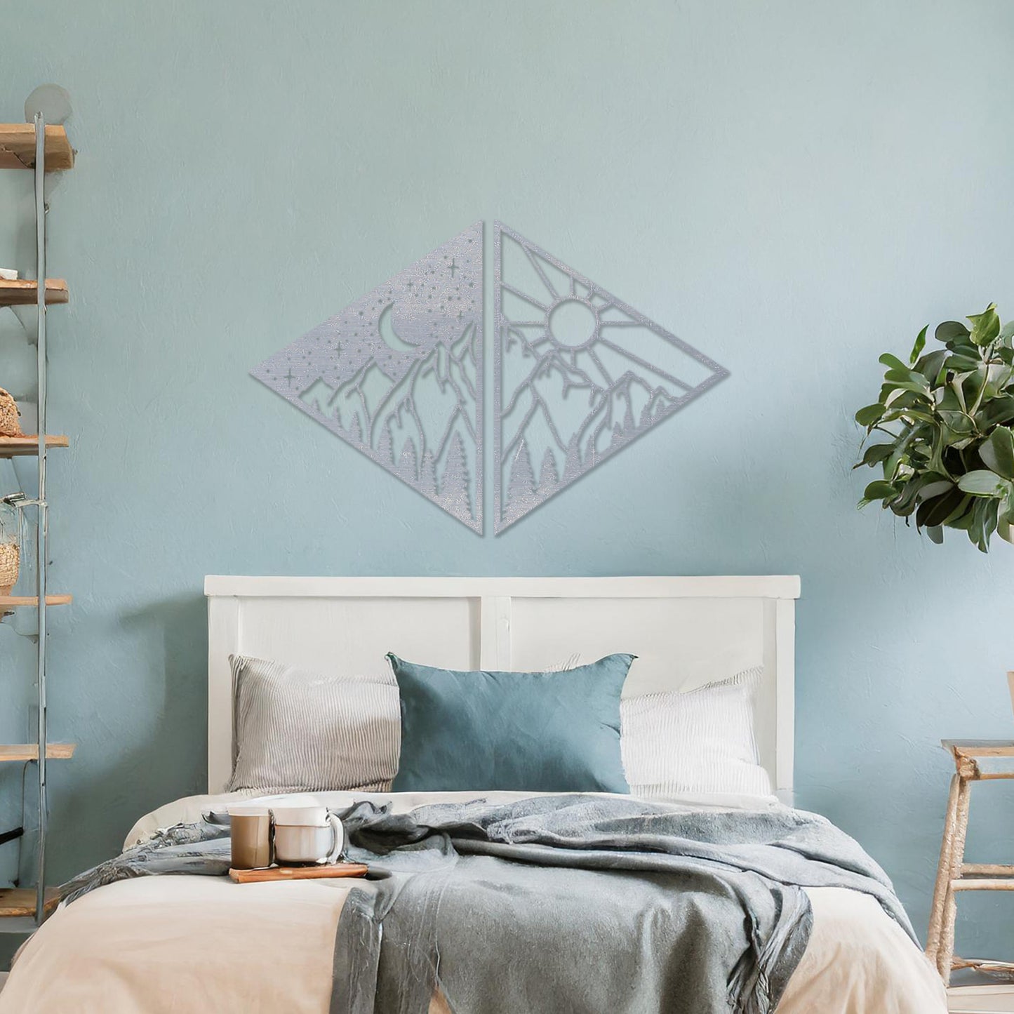 Wooden wall art design featuring a diamond-shaped composition split into two panels: one with a crescent moon and stars over mountains, and the other with a sun above the same landscape, placed on a neutral wall within modern room decor. 
