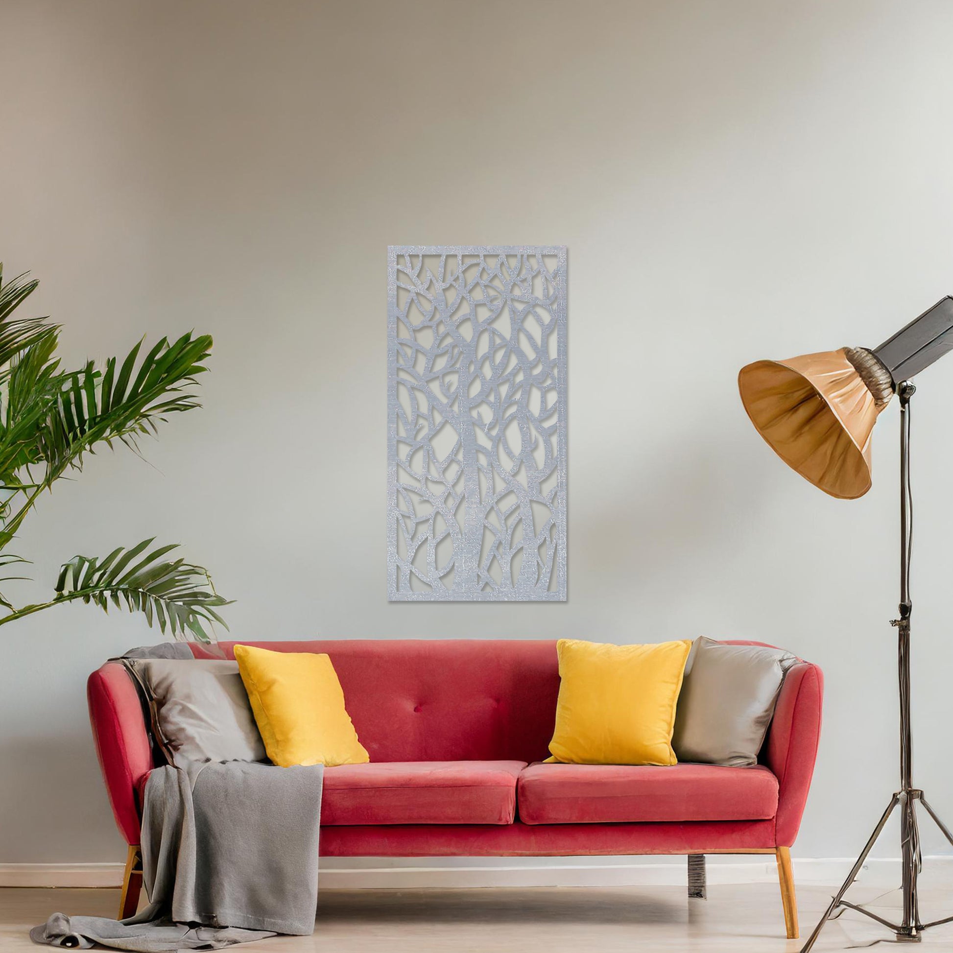 Wooden wall art featuring a vertical design of intertwined tree trunks and branches, displayed on a neutral wall within modern room decor, showcasing its intricate and artistic craftsmanship.