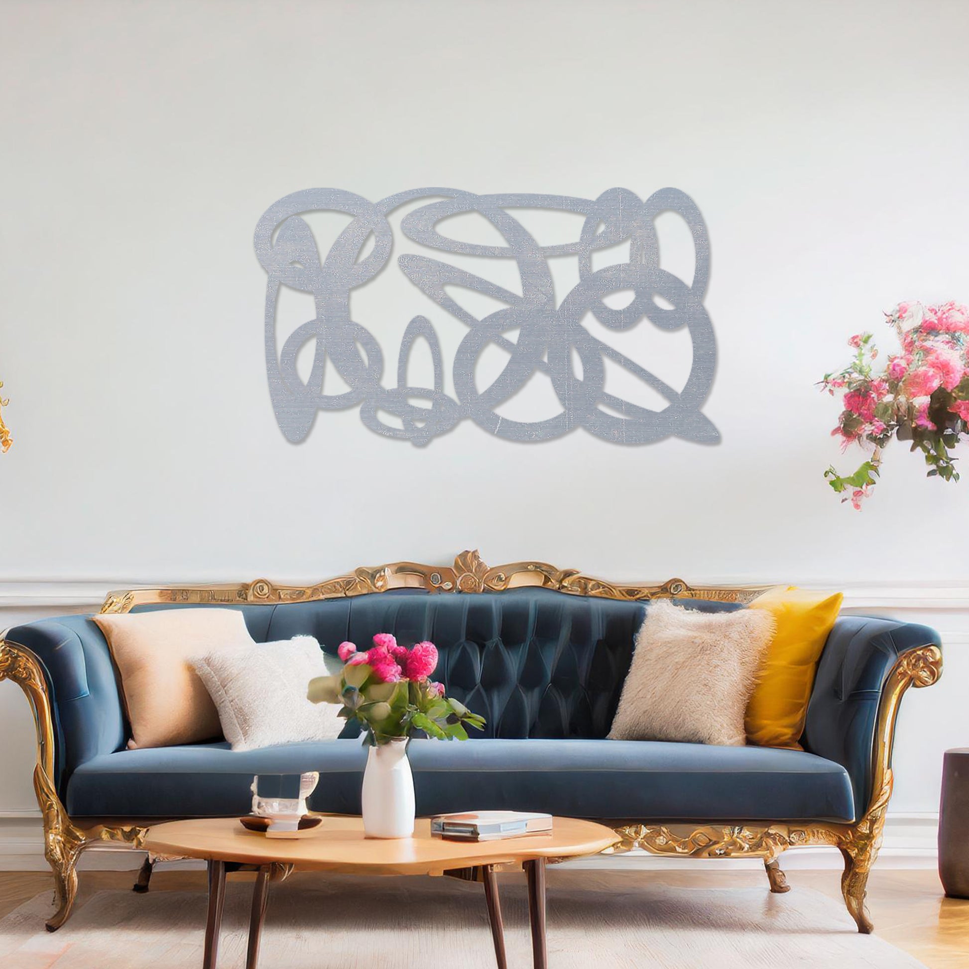 Wooden wall art design featuring an abstract composition of interwoven loops and shapes, placed on a neutral wall within modern room decor. The design combines flowing lines and organic forms for a contemporary, artistic feel.