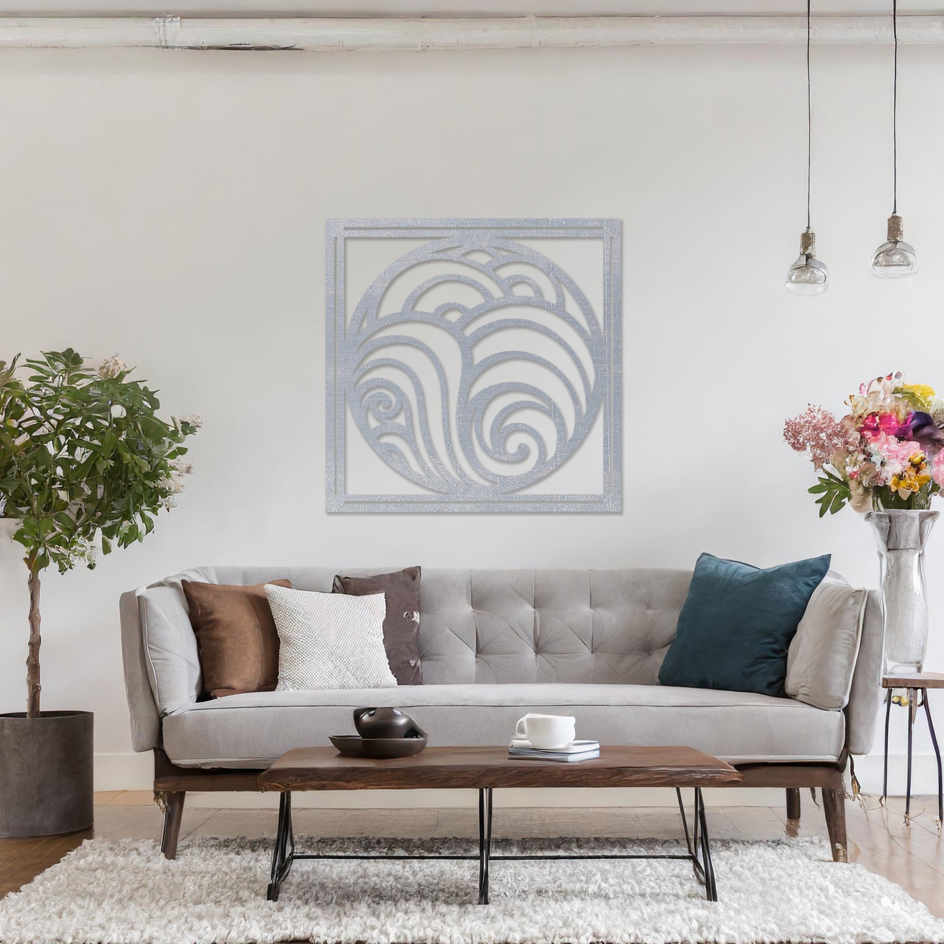 Wooden wall art design featuring a circular composition with flowing, wave-like patterns, placed on a neutral wall within modern room decor. The design evokes a sense of movement and balance with its rhythmic curves.