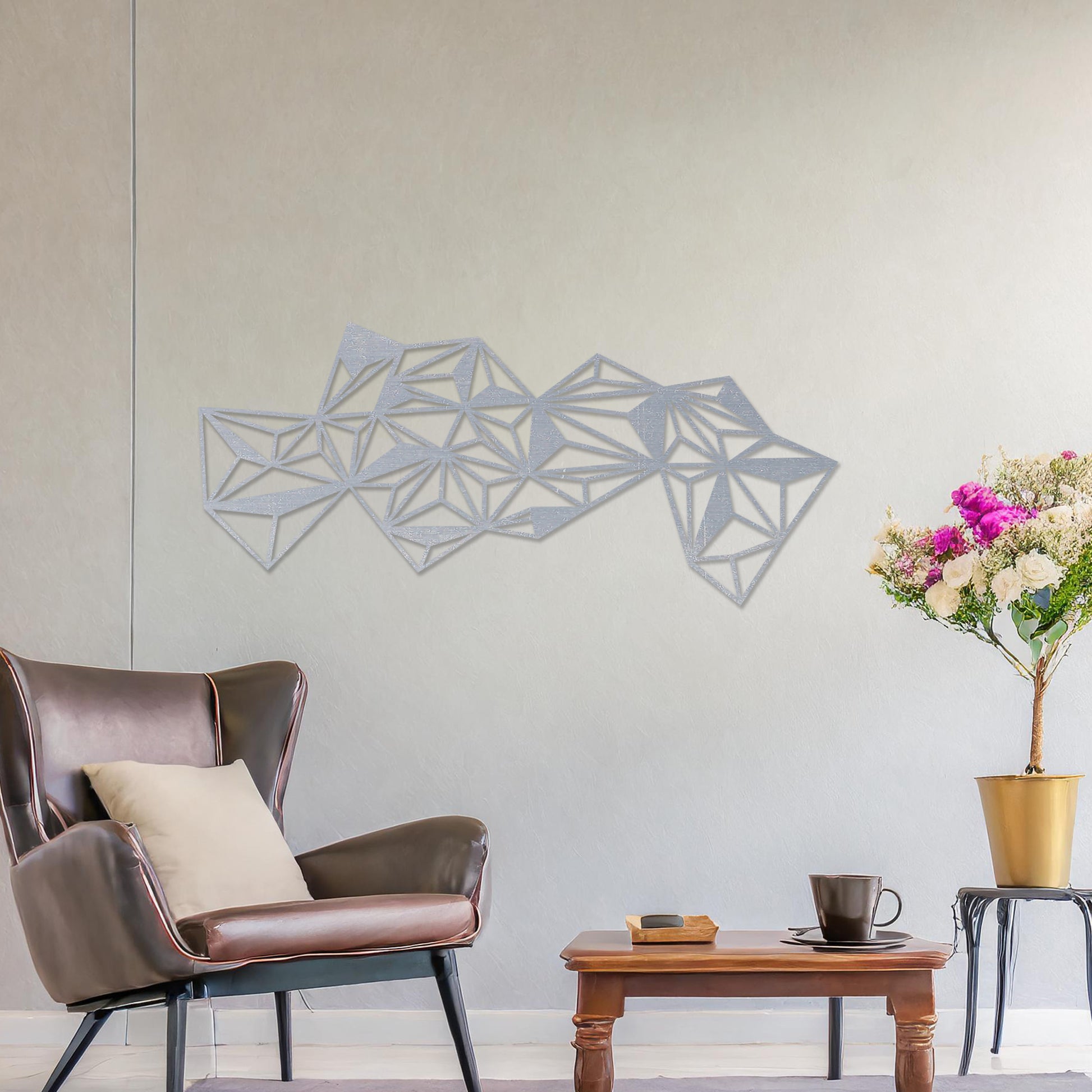 The design features an abstract arrangement of interlocking triangles, forming a dynamic, geometric pattern. Its sharp lines and angles create a bold, modern look, perfect for contemporary spaces.