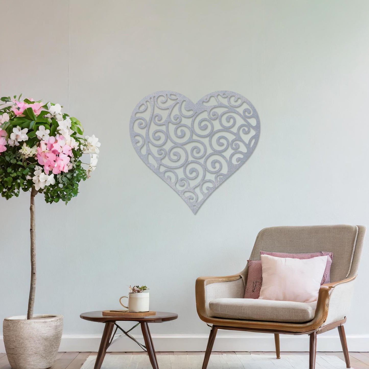 Wooden wall art featuring a heart-shaped design with intricate swirling patterns, displayed on a neutral wall within modern room decor, showcasing its elegant and artistic craftsmanship.