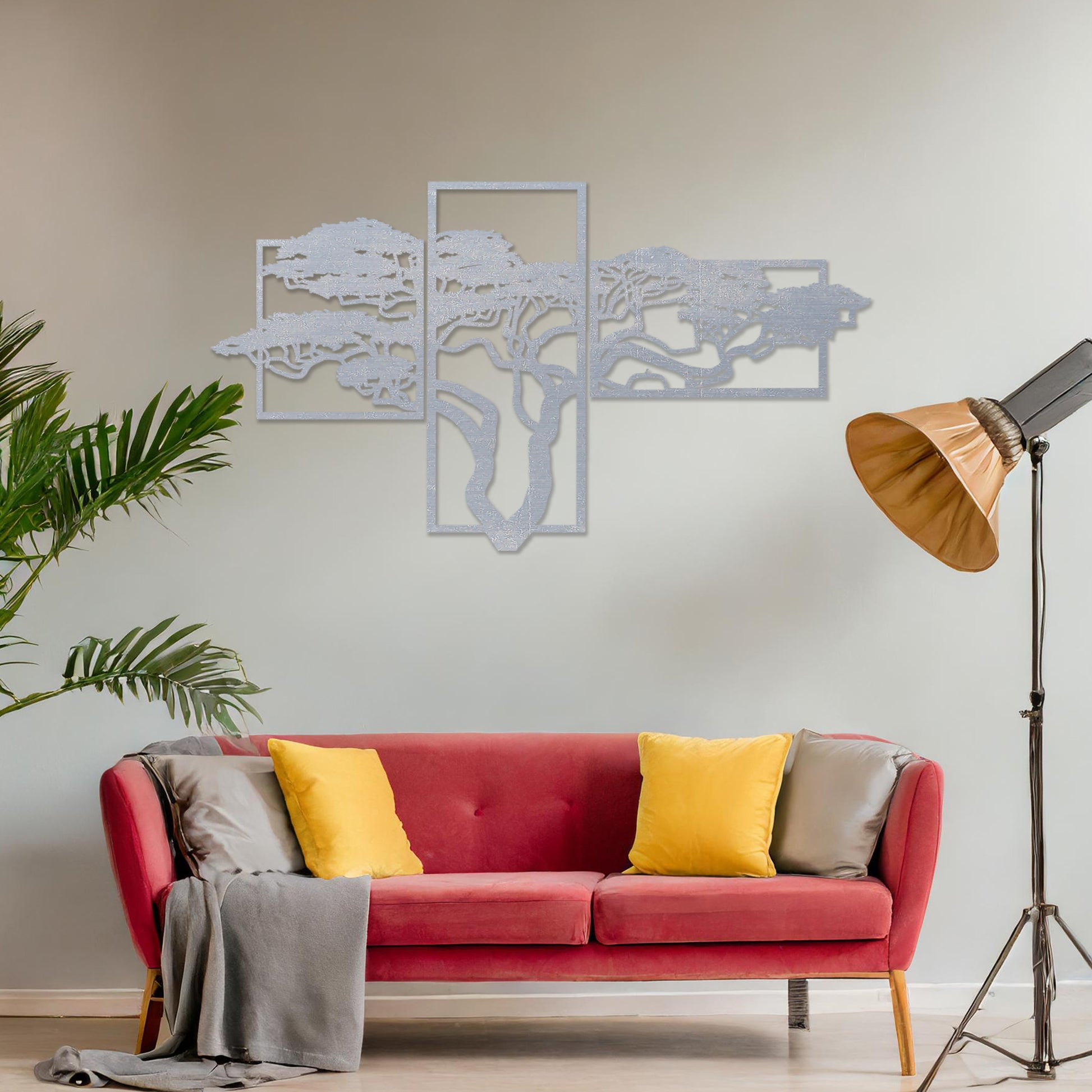 Wooden wall art featuring a multi-panel design of a tree with intricate branches, placed on a neutral wall within modern room decor, showcasing its detailed craftsmanship and elegant composition.