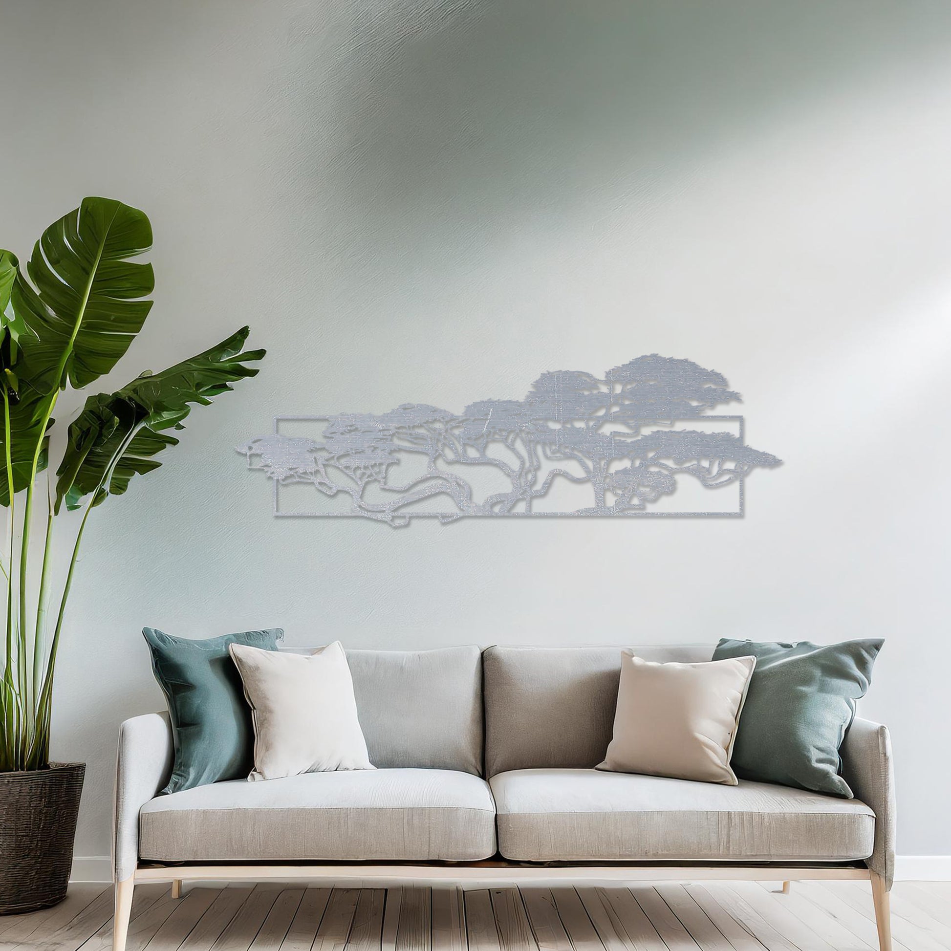 Wooden wall art featuring a panoramic design of windswept trees with intricate branches, displayed on a neutral wall within modern room decor, emphasising its natural elegance and artistic detail.