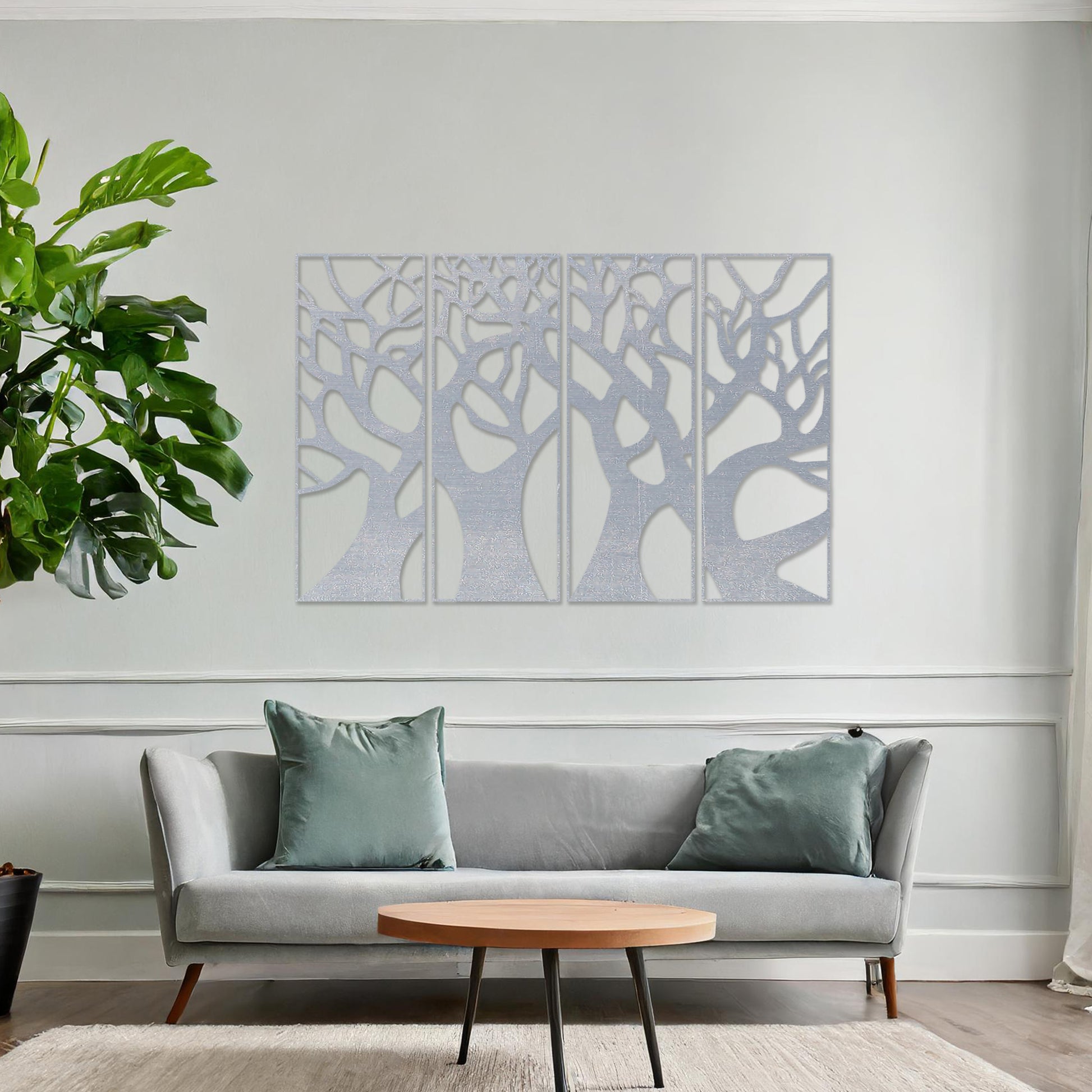 Wooden wall art featuring a set of four panels with an abstract tree design, showcasing interwoven trunks and branches, displayed on a neutral wall within modern room decor, highlighting its intricate and artistic craftsmanship.