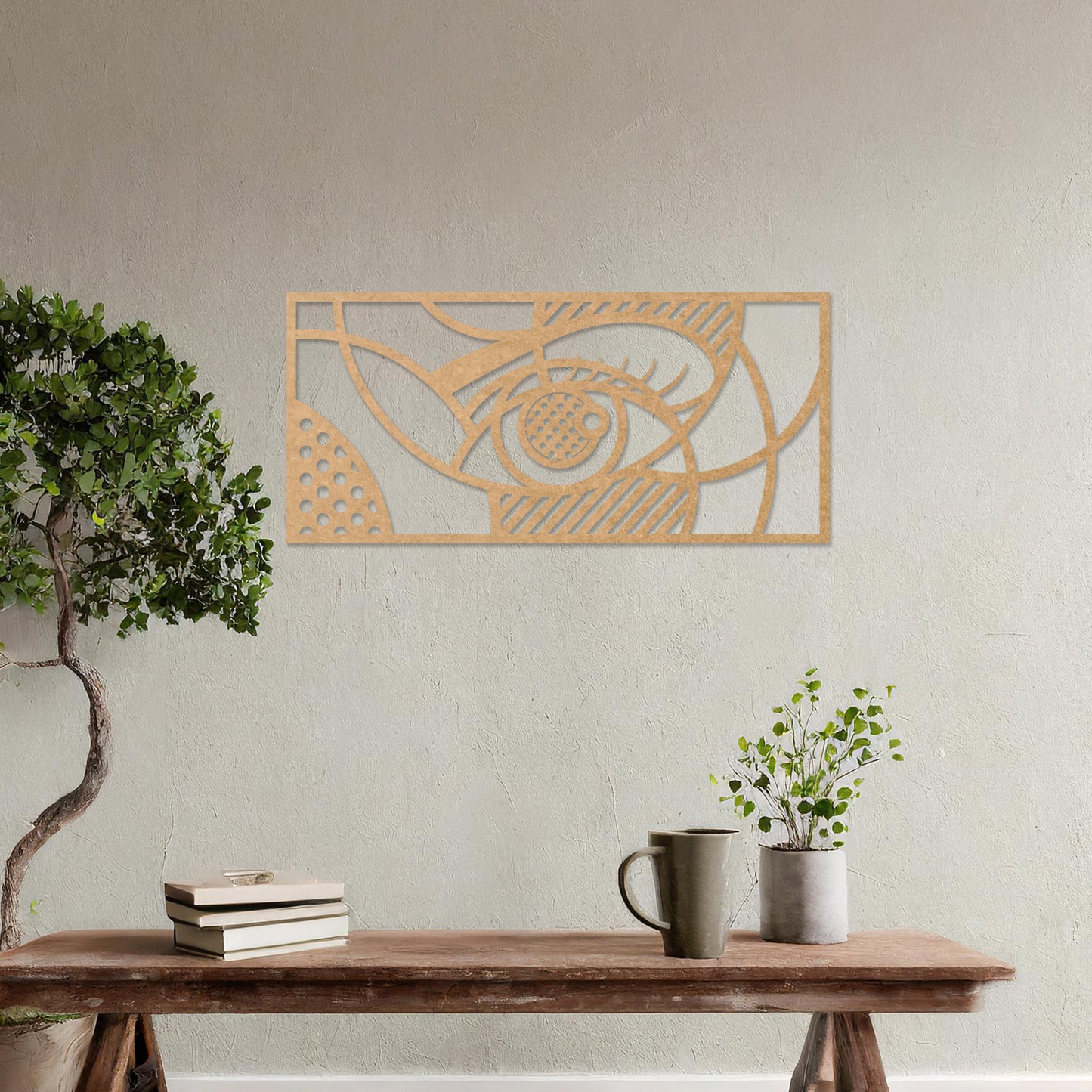 Wooden wall art design featuring a stylized eye within an abstract geometric composition, placed on a neutral wall within modern room decor. The design combines flowing lines and patterns for a contemporary, artistic look.