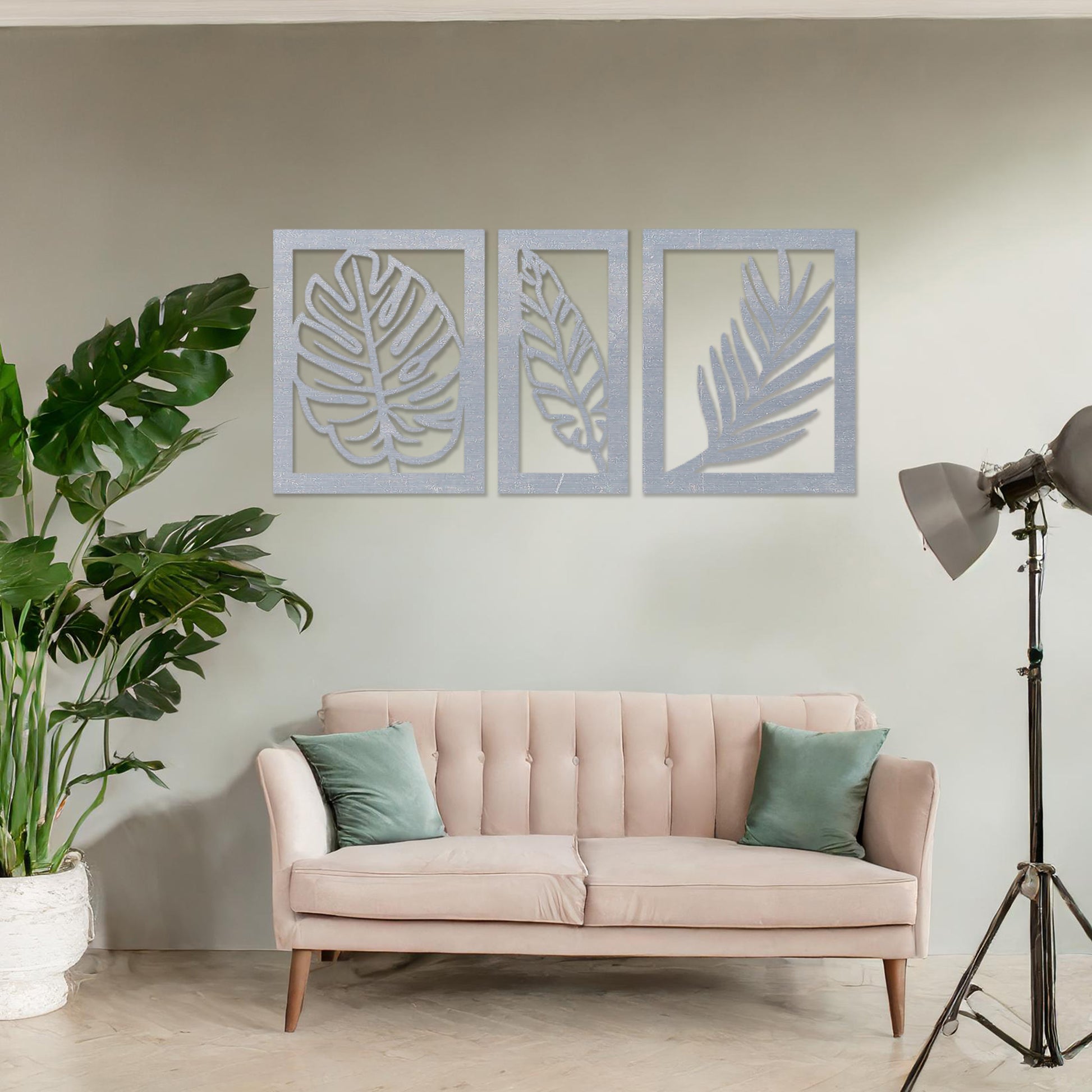 Wooden wall art featuring a sequence of moon phase designs with intricate geometric and floral patterns. The artwork is displayed on a neutral wall within modern room decor, highlighting its celestial and artistic charm.